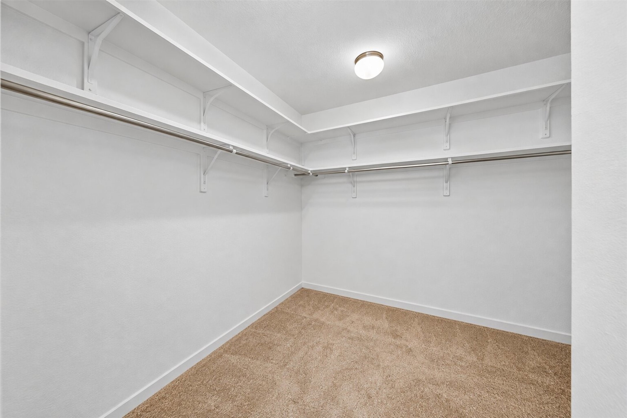 AI pic of huge walk in closet in Primary bedroom