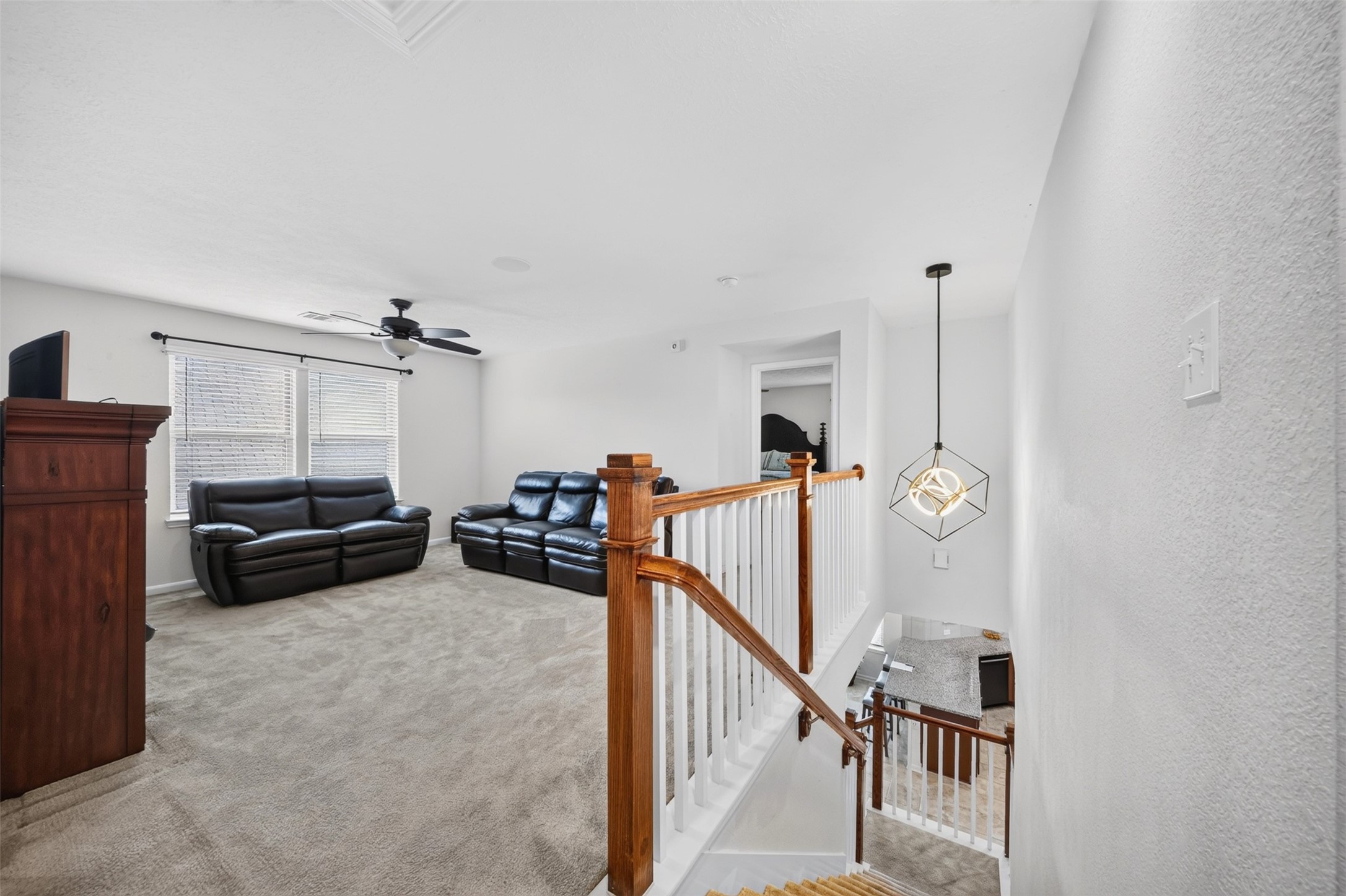 Stairs from 1st to game room on 2nd floor