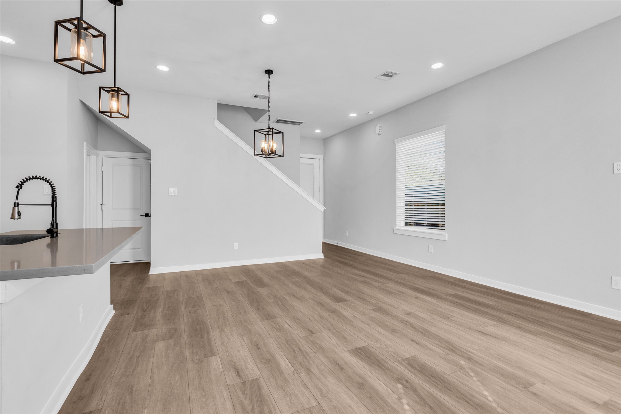 Room to relax and unwind, with recessed lighting and an easy flow to the stairs. Room to relax and unwind, with recessed lighting and an easy flow to the stairs.