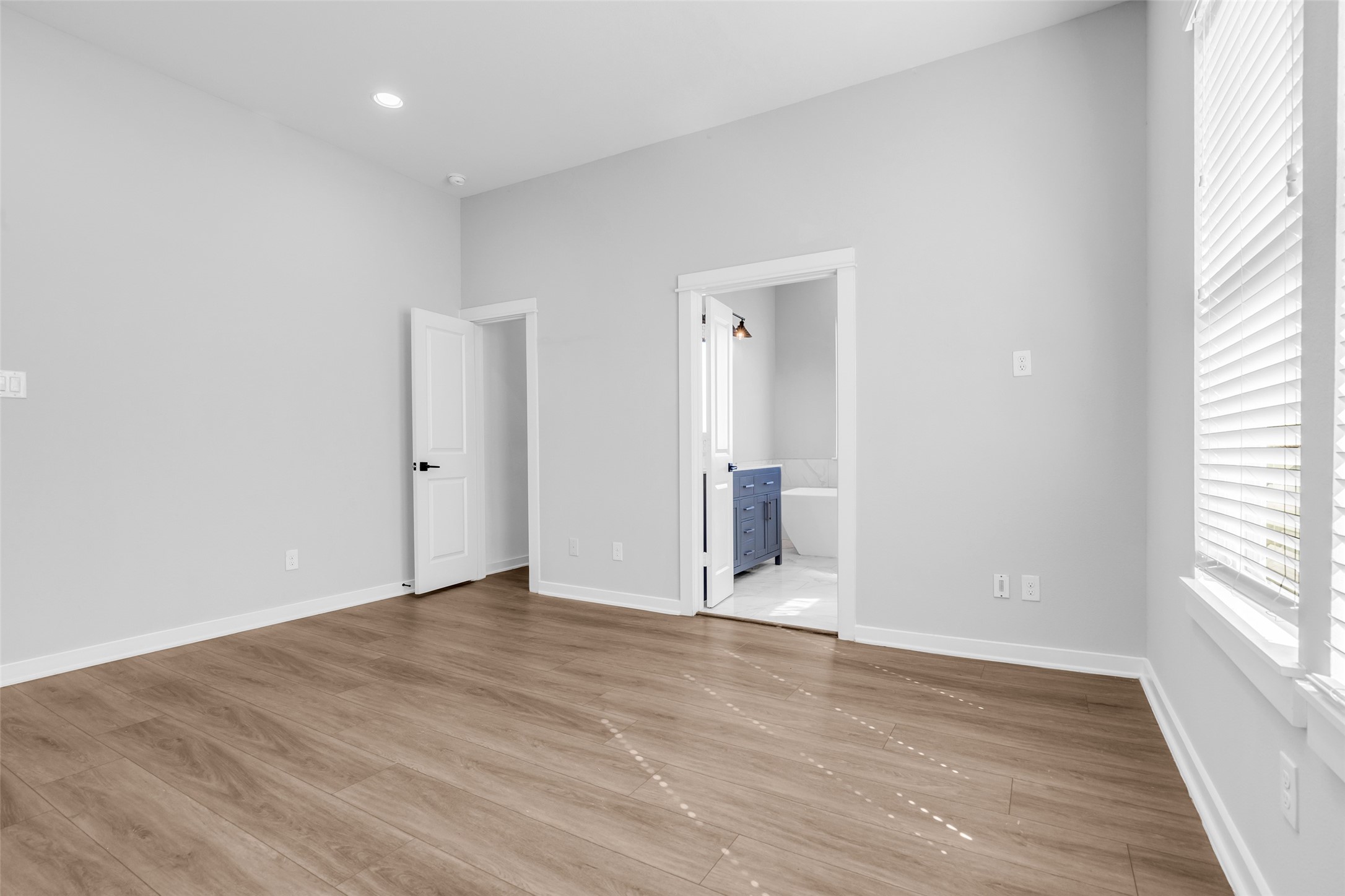 A private retreat at the end of the day, with its own ensuite bath and walk-in closet.