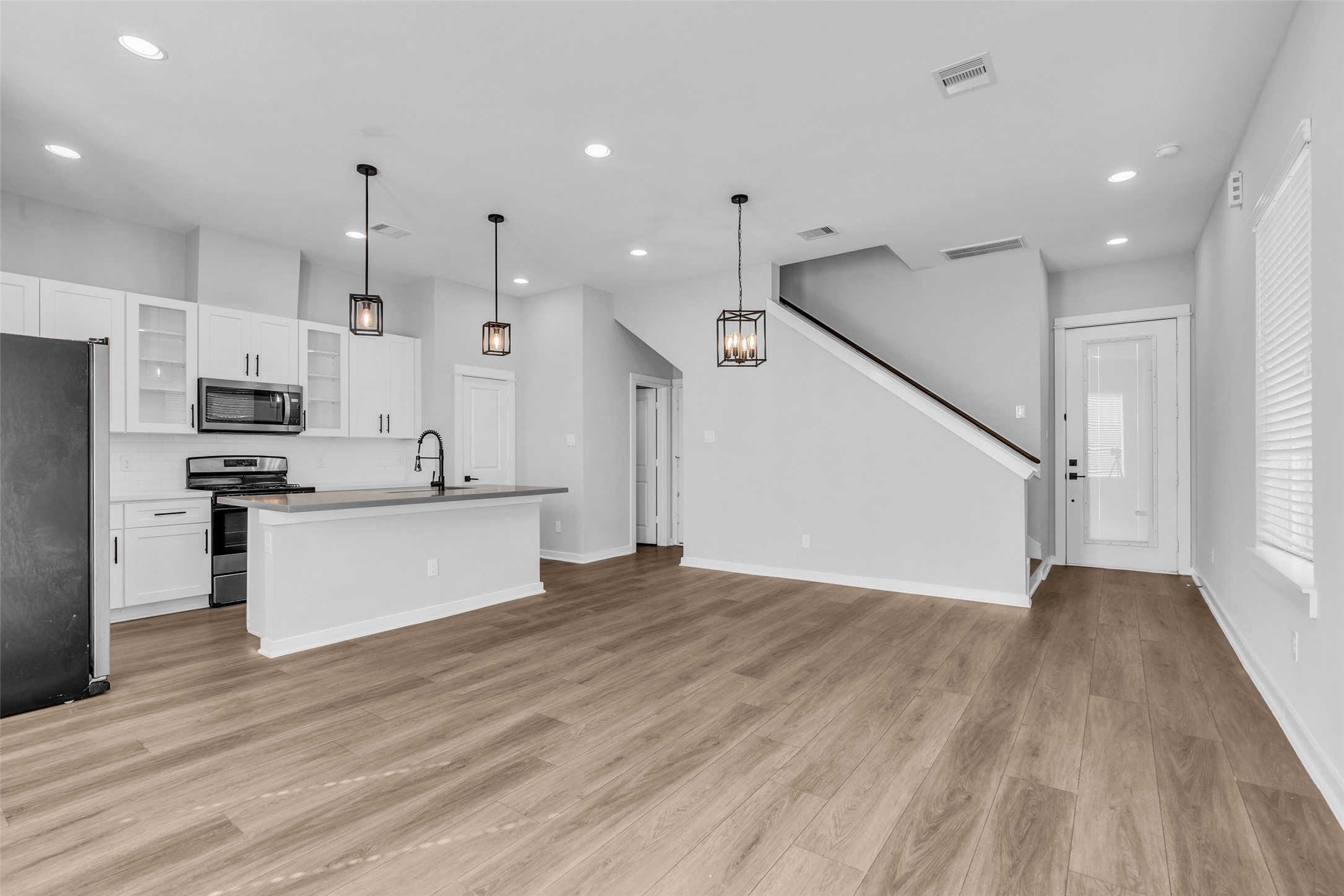 One open, light-filled layout made for hosting, from the living area to the kitchen island. One open, light-filled layout made for hosting, from the living area to the kitchen island.