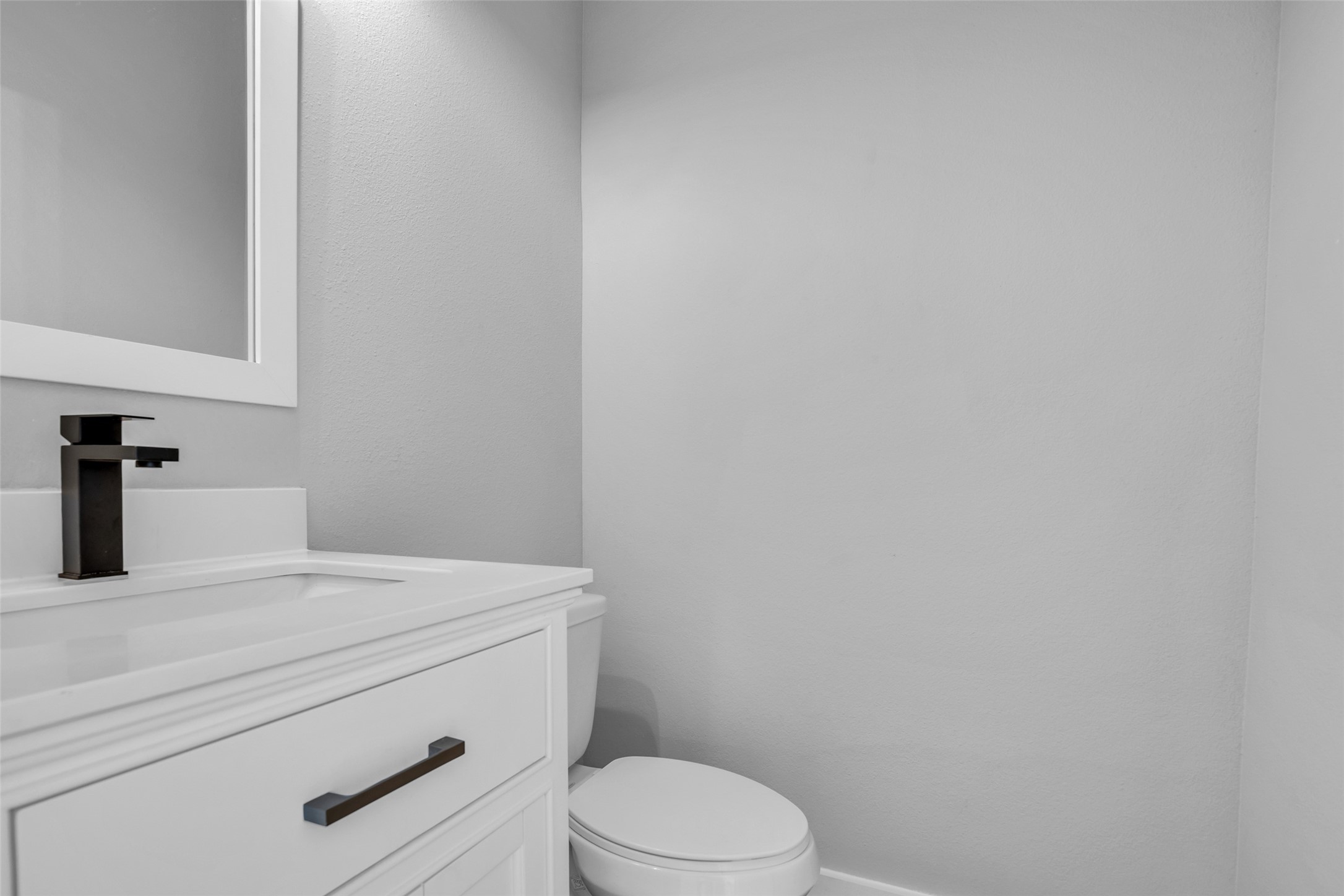 A first-floor powder room so guests never have to head upstairs.