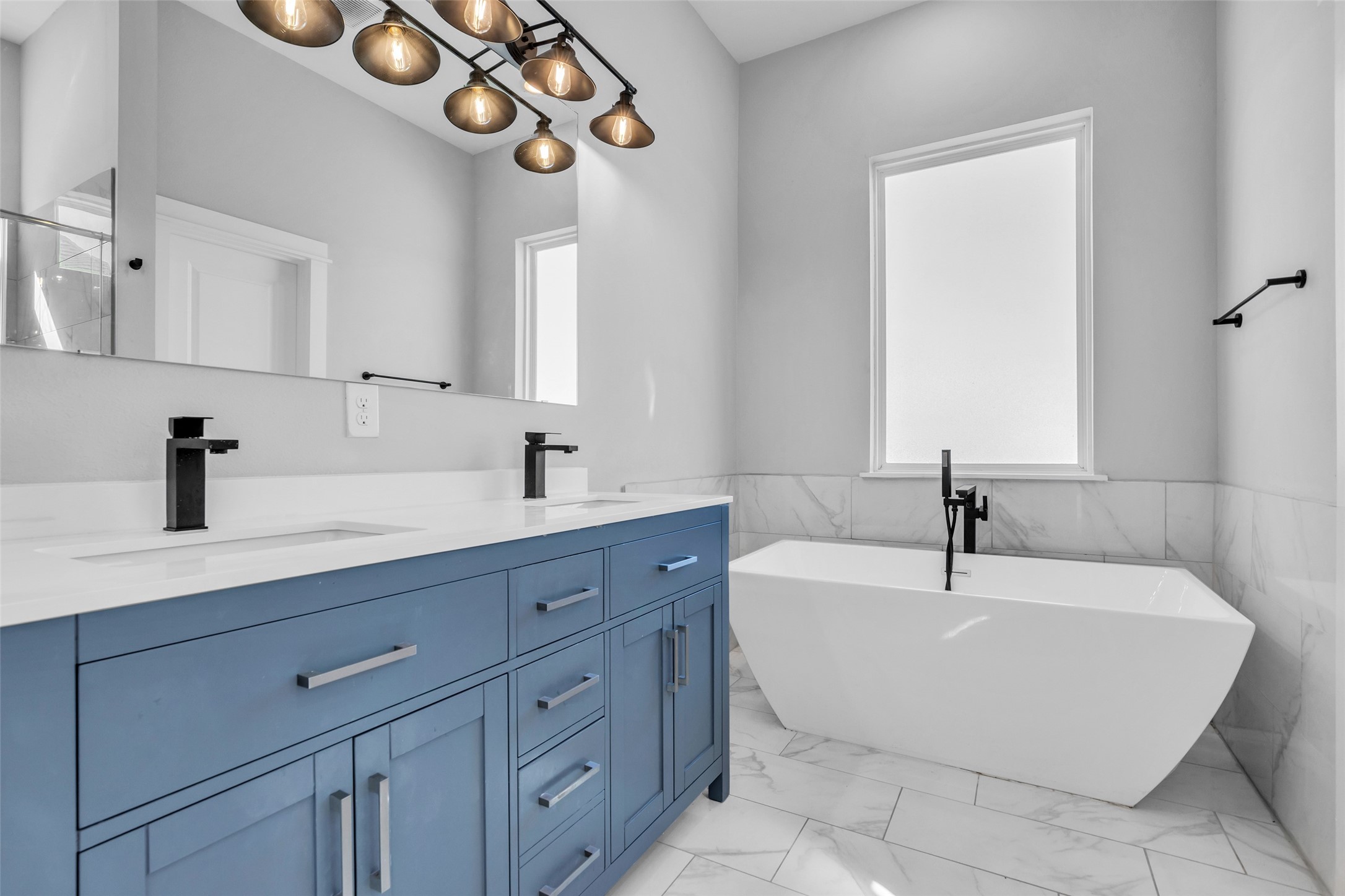 Unwind with a soak in the freestanding tub, and a double vanity means no waiting your turn in the morning.