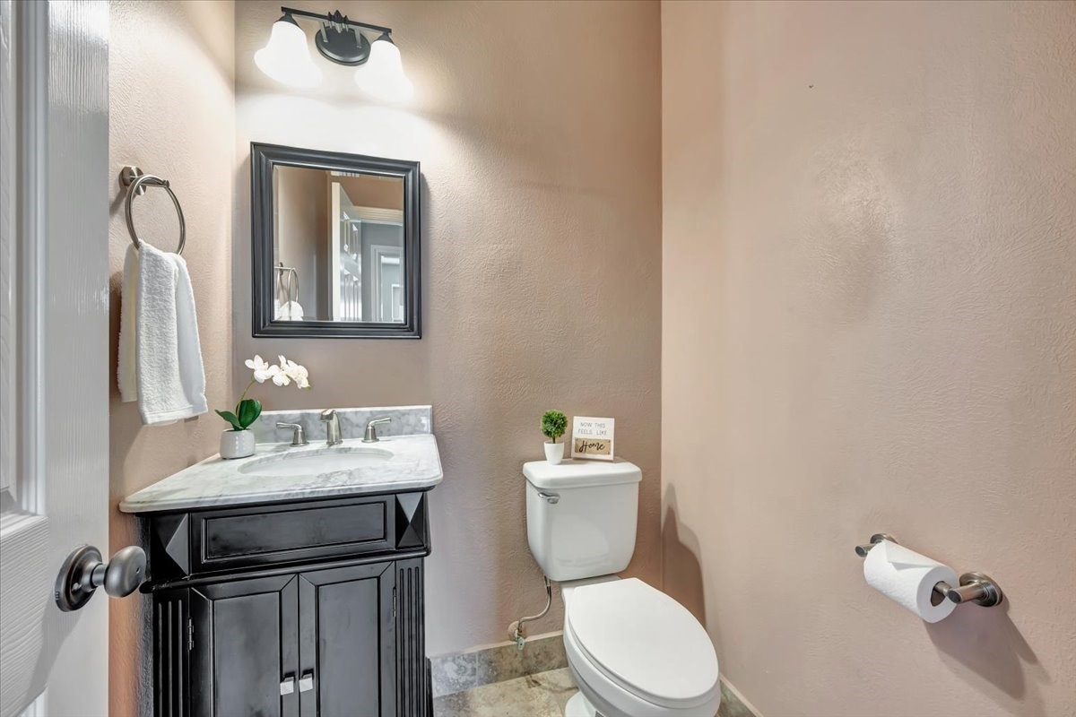 Convenient first-floor guest powder room.