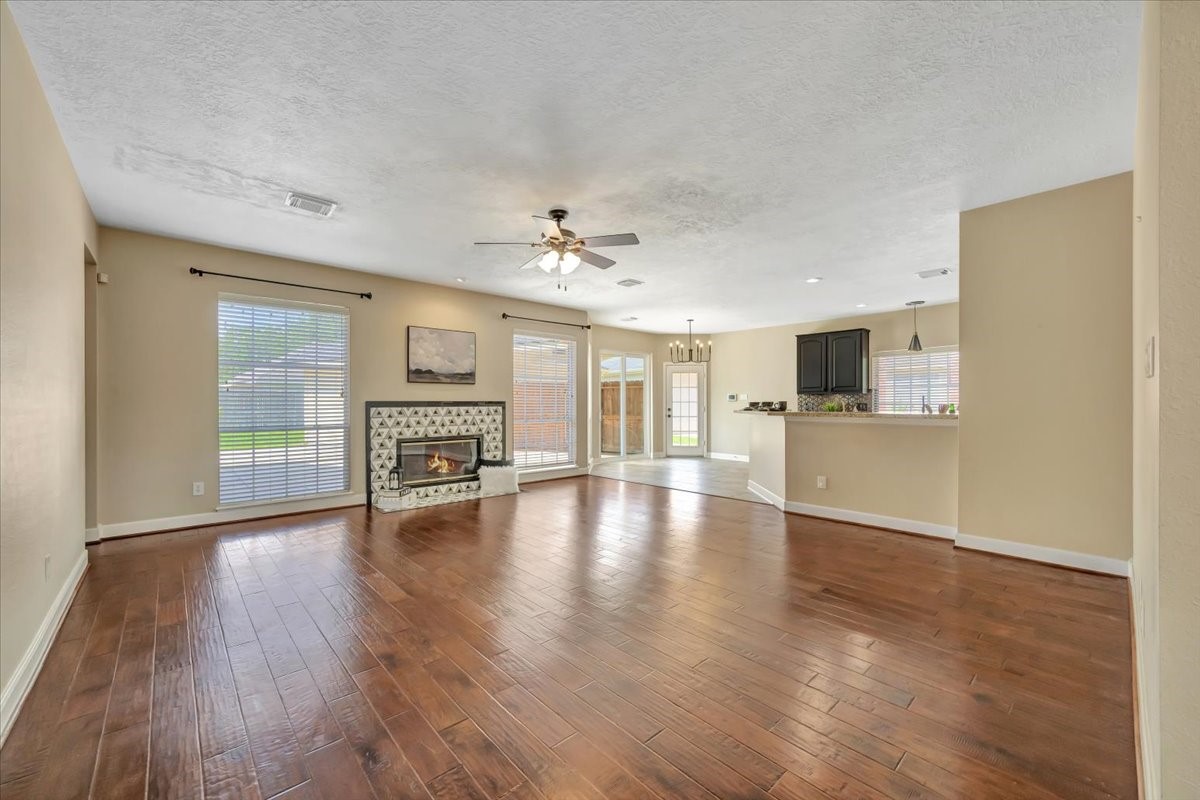 Bright, open two-story entry flows seamlessly into the expansive living room beyond. Bright, open two-story entry flows seamlessly into the expansive living room beyond.