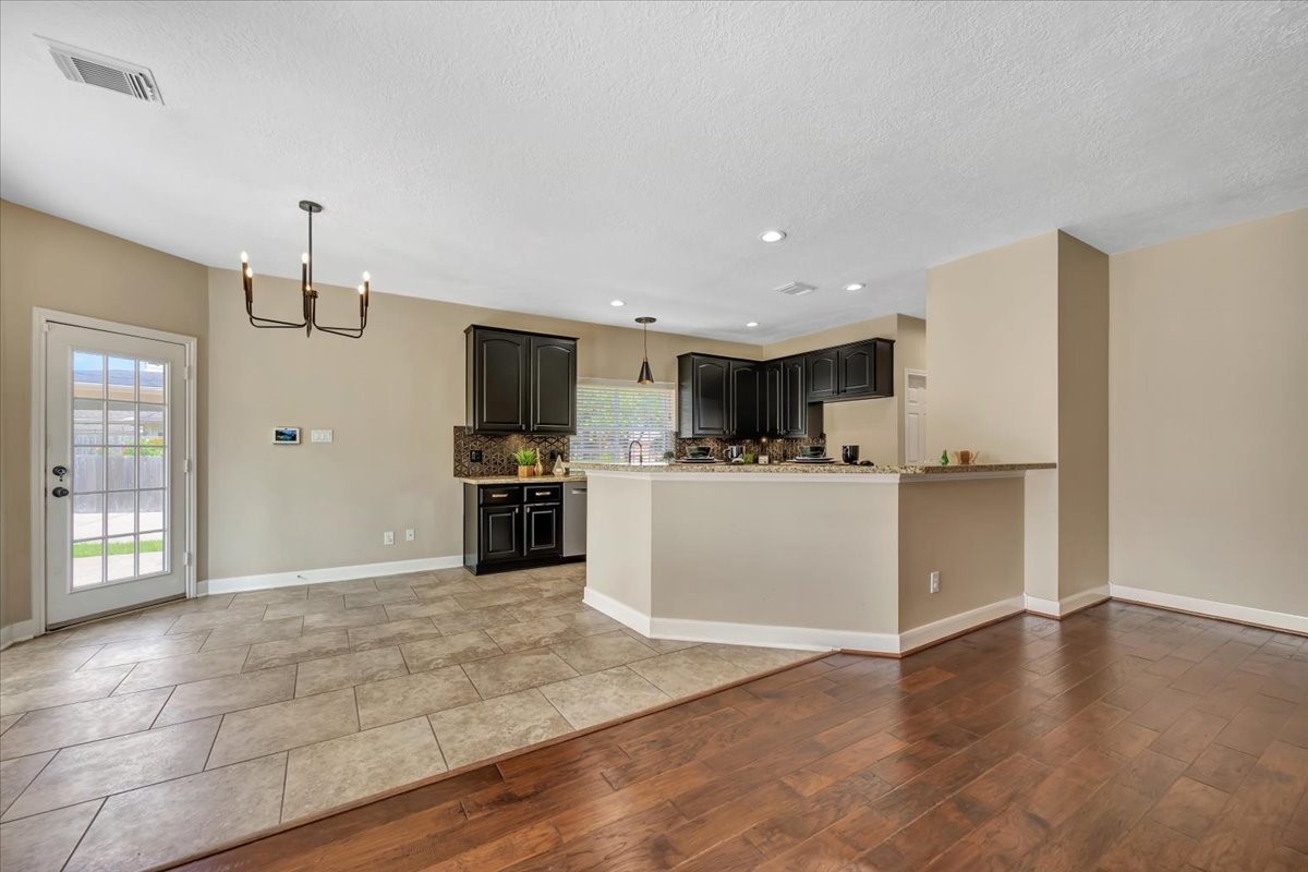 Another view of the inviting family room and its open layout. Another view of the inviting family room and its open layout.