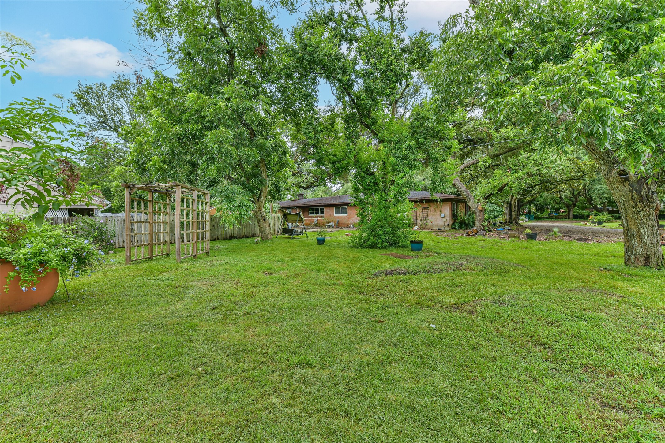 View from front of the lot on Estates drive looking back towards the house.
