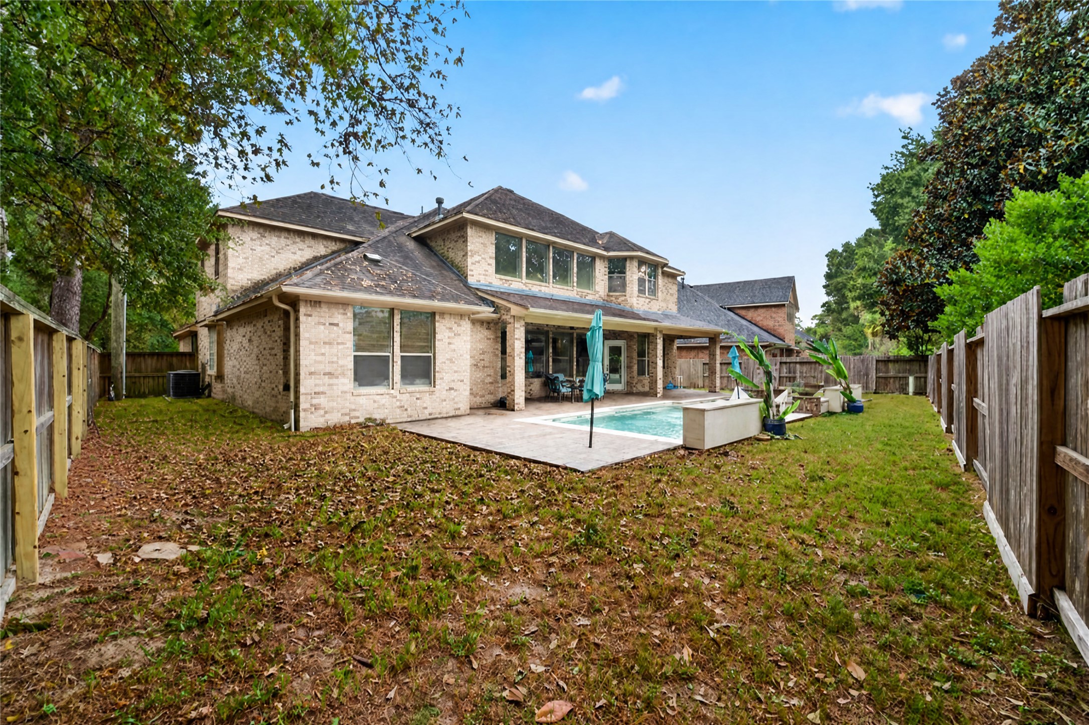 Good yard space behind the pool and on both sides of the house.
