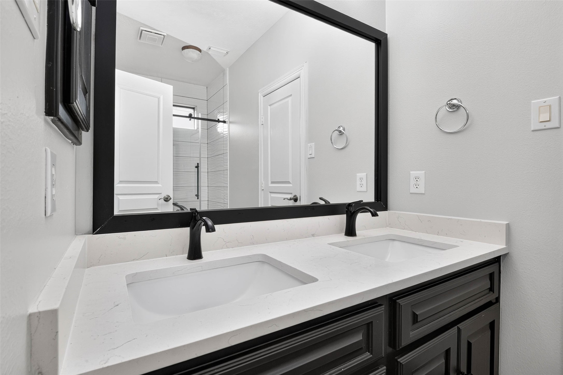 Remodeled Upstairs Vanity with Quartz Countertops & Double Sinks.