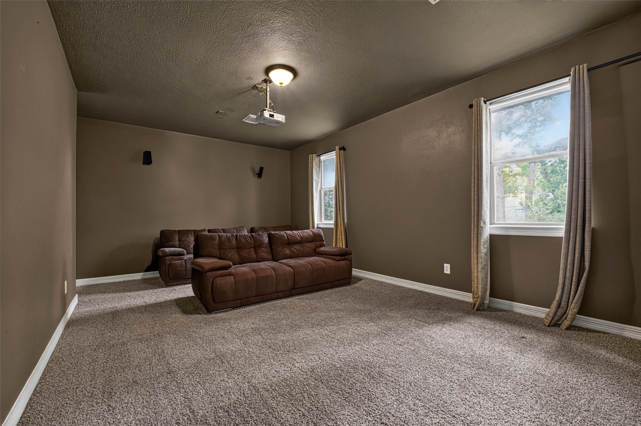 This is the only room in the whole house with carpet, and the carpet is brand new.