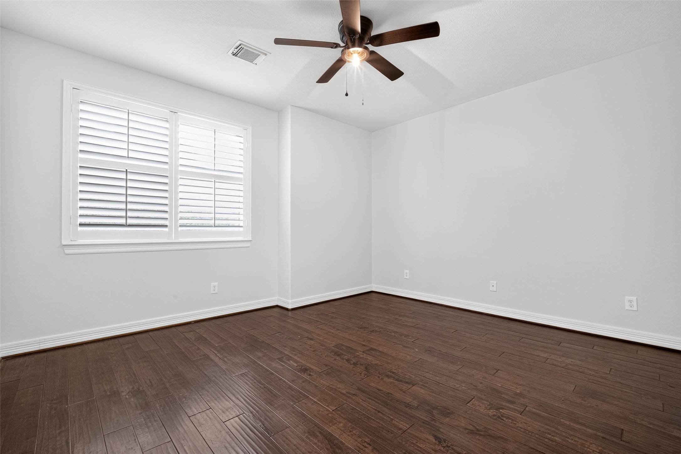 Two of three bedrooms upstairs.
