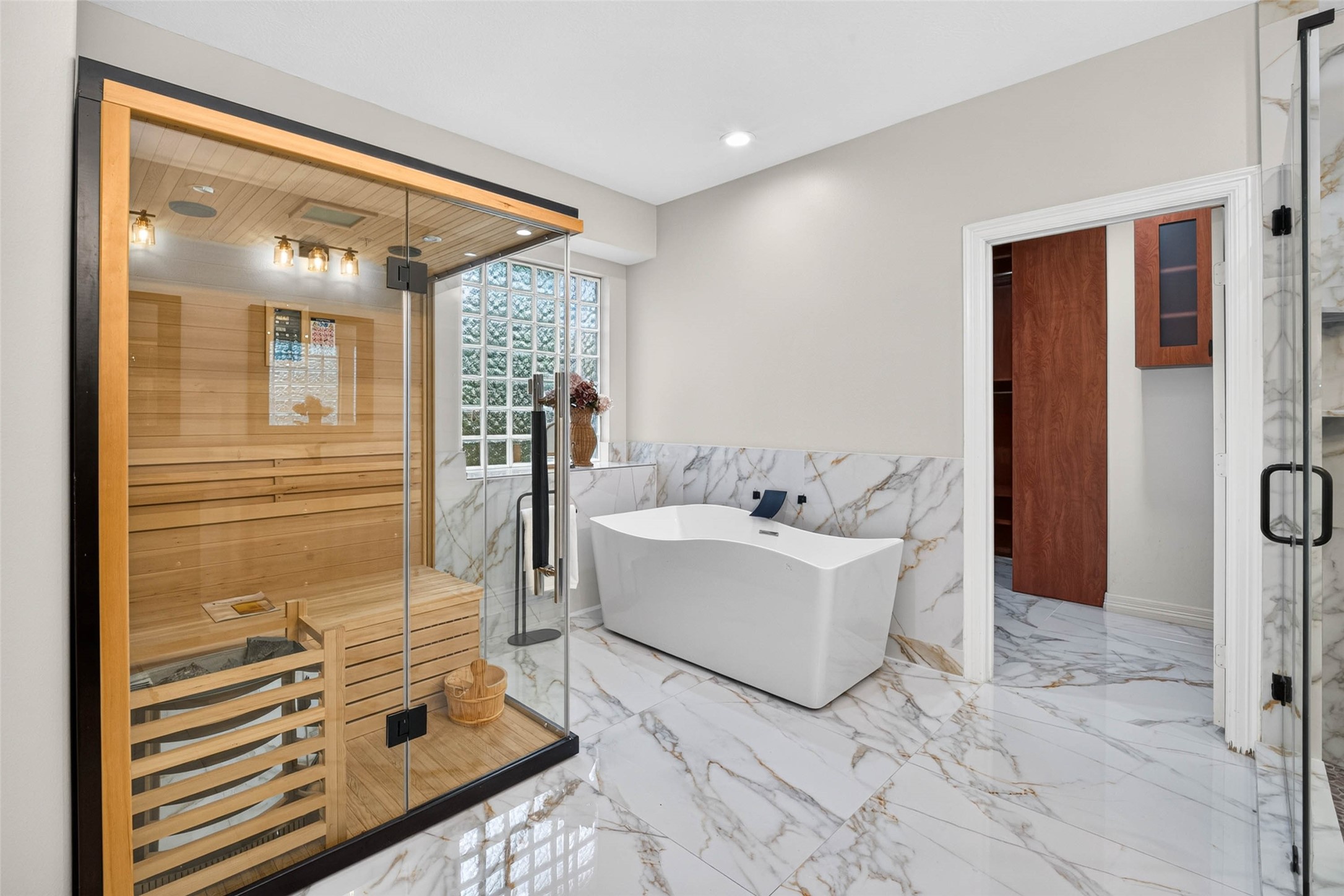 This impressive Primary bathroom has been fully remodeled top to bottom. It's a MUST SEE!