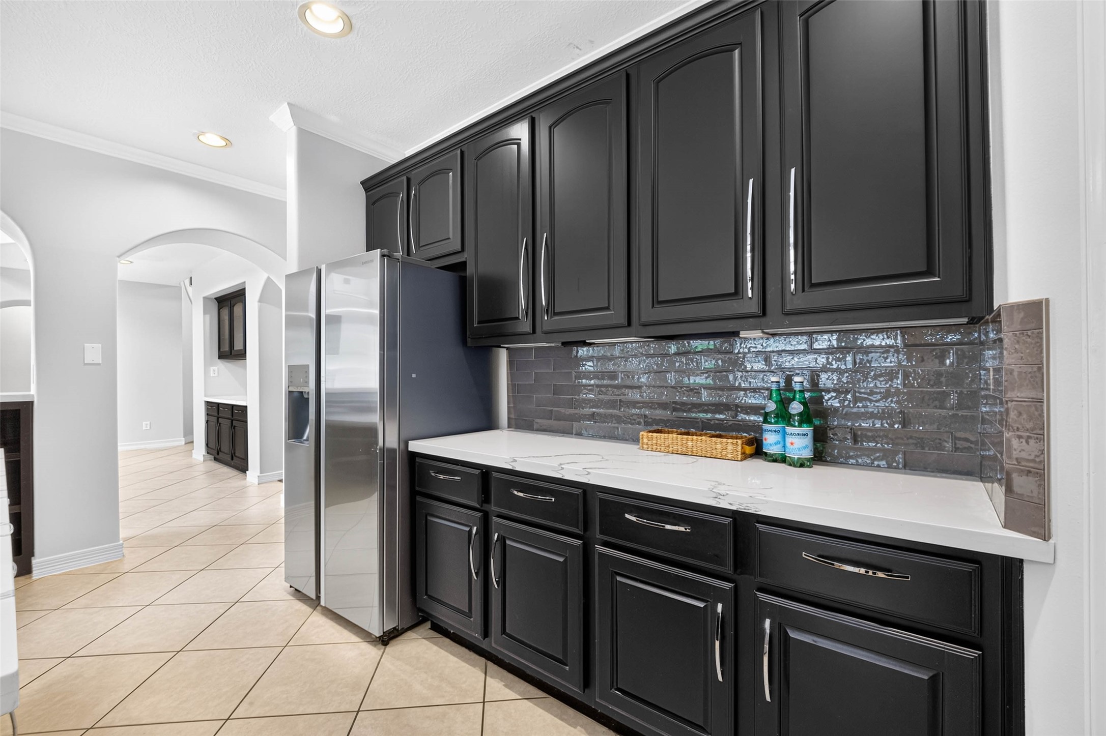 The stainless fridge is included.