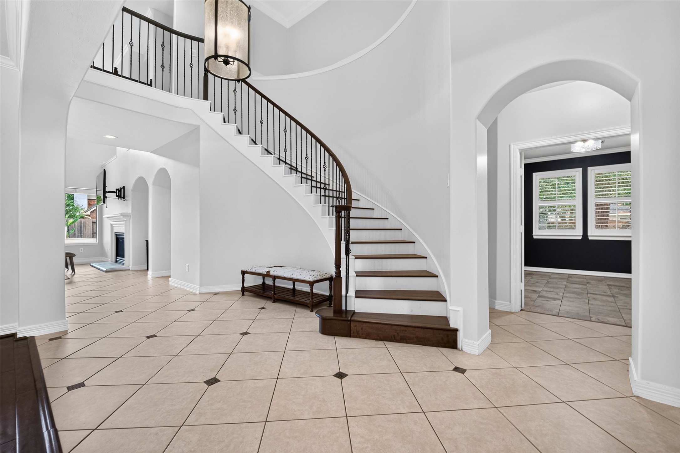 A lovely entrance with spiral staircase.