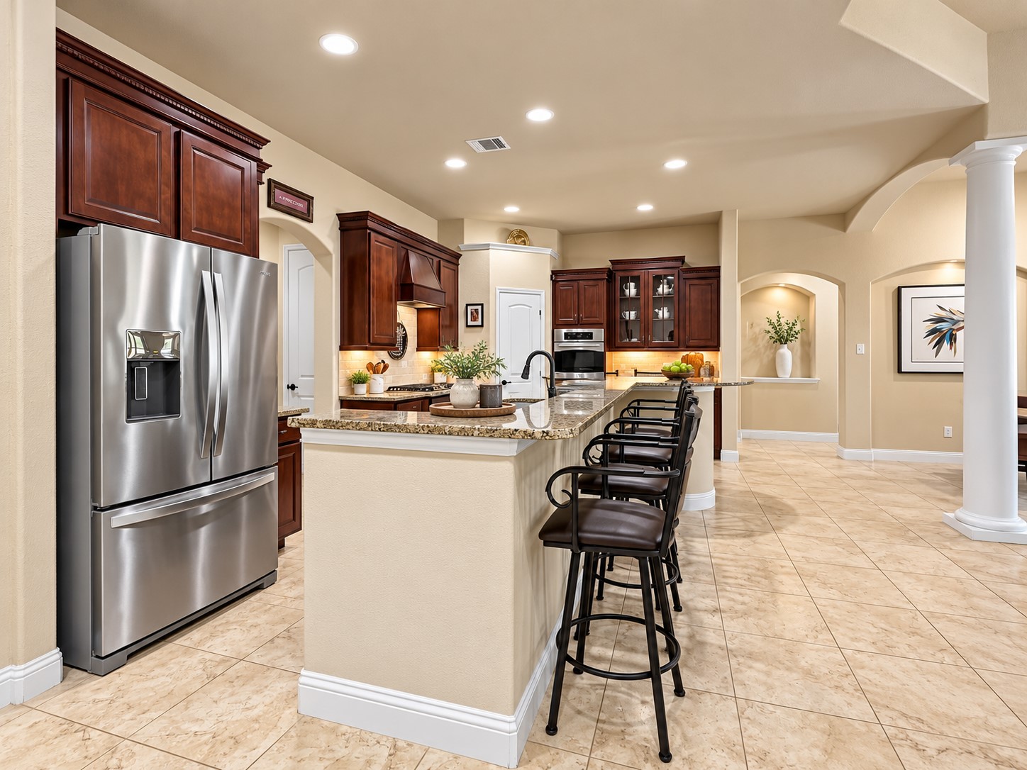 Abundant cabinetry and generous counter space give you room to spread out while cooking, baking, and preparing meals. Pull up a seat at the breakfast bar for a quick breakfast or an easy place to catch up with friends while entertaining.