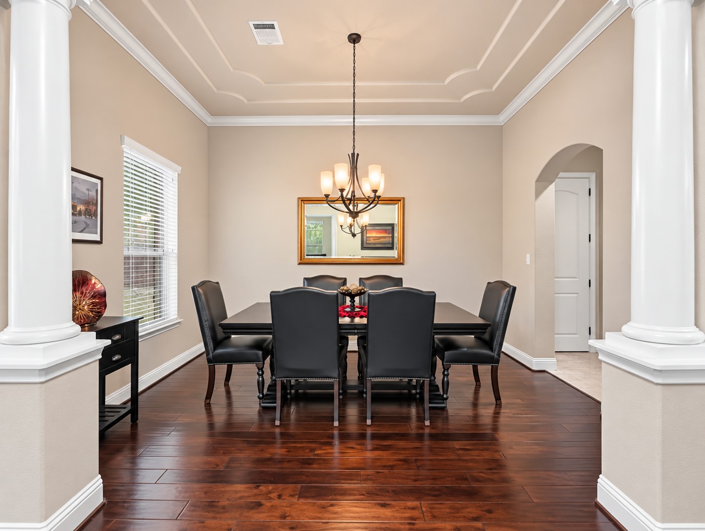 The large formal dining room provides the room to make special occasions feel a little more memorable. Add a grand formal dining table to this lovely space.