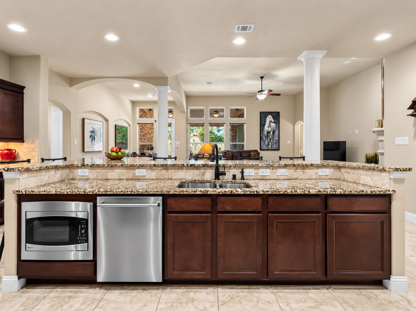 Open to the living and dining areas, the kitchen keeps everyone connected whether you're preparing dinner or hosting friends.