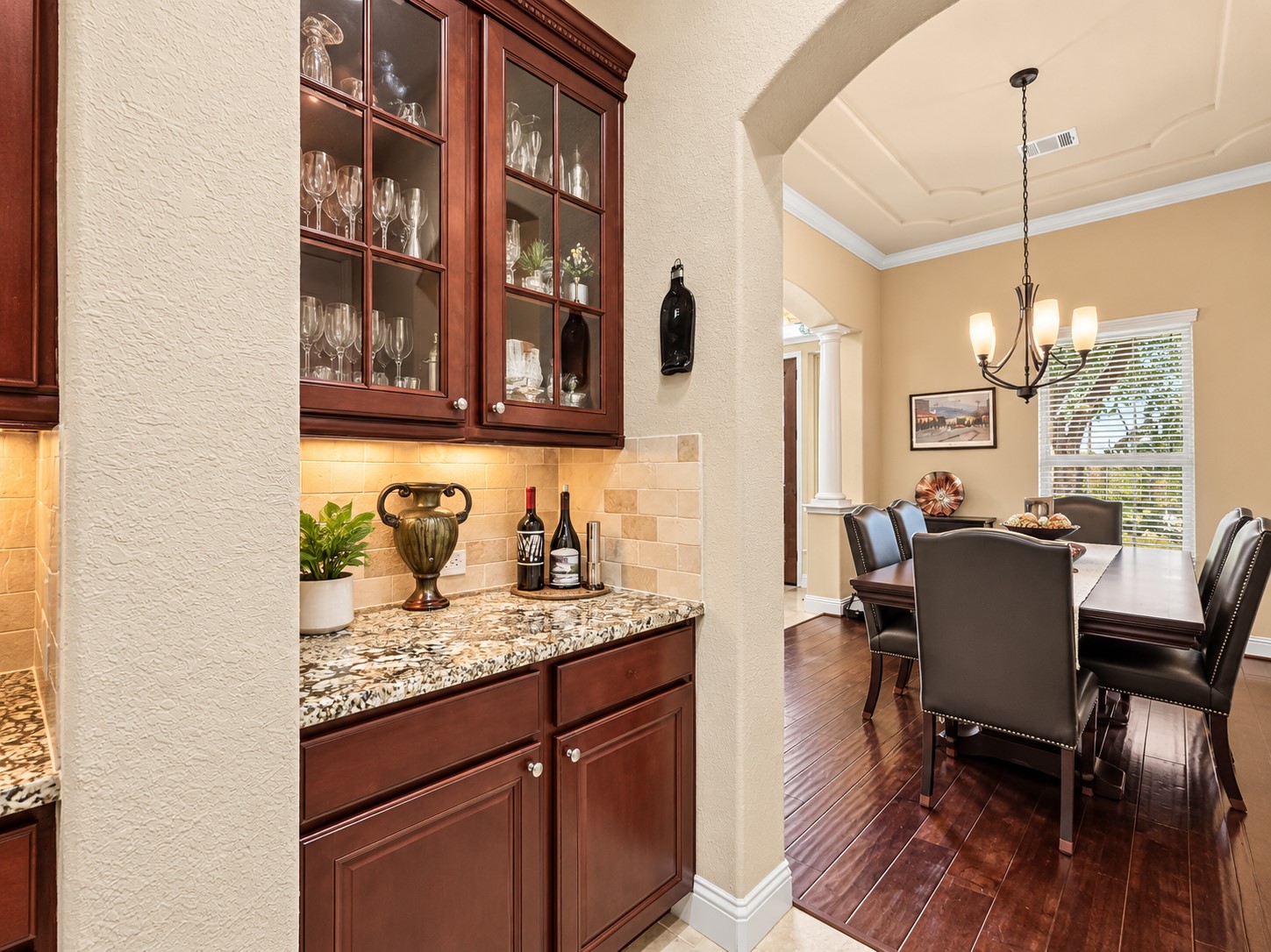 The Butler's Pantry offers extra cabinet and counter space for storing your kitchen items. It also offers a second entrance to the beautiful formal dining room.