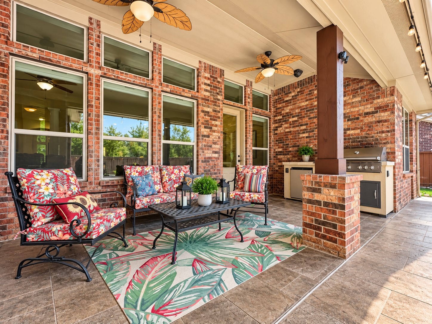 So much space to enjoy while staying cool under the beautiful backyard patio. Enjoy the added space for the outdoor kitchen.