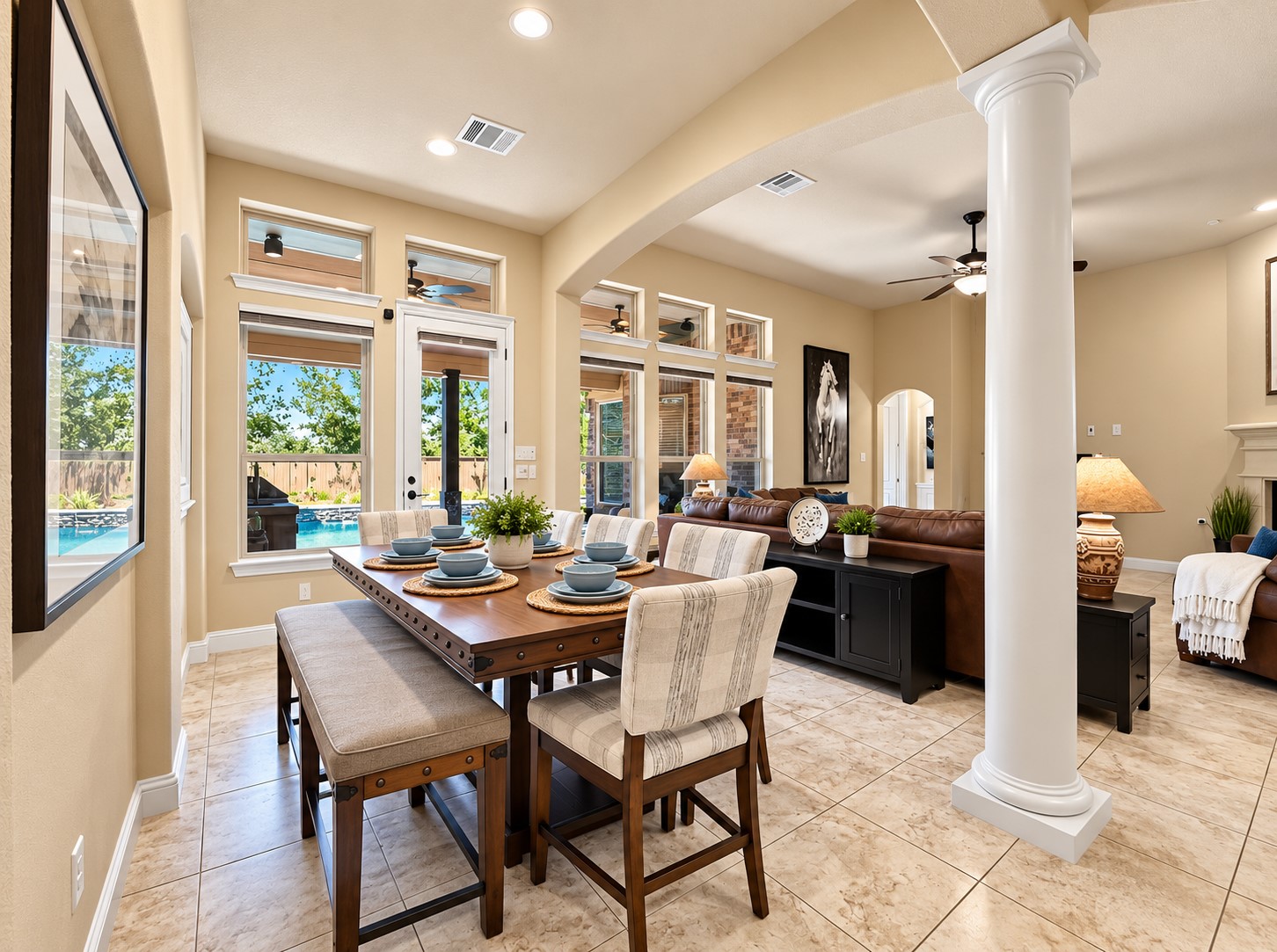 An open connection between the dining space and kitchen makes everyday dinners and casual get-togethers feel comfortable and connected.