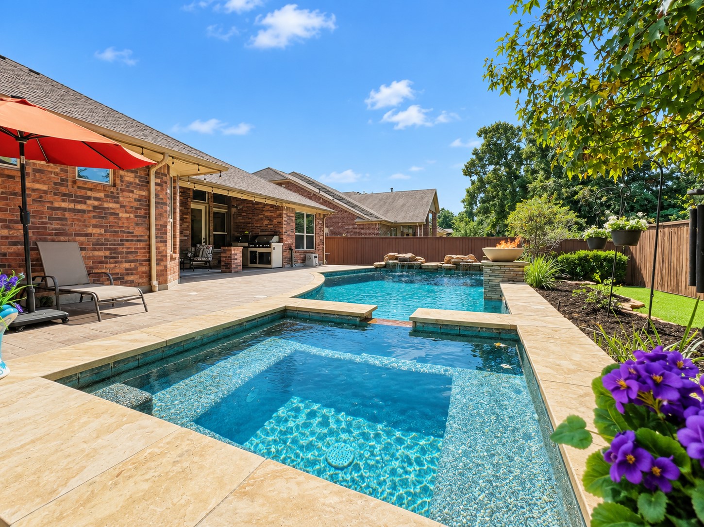 Step into your own backyard oasis, where the pool and spa create a wonderful setting for sunny afternoons, relaxing evenings, and time with family and friends.