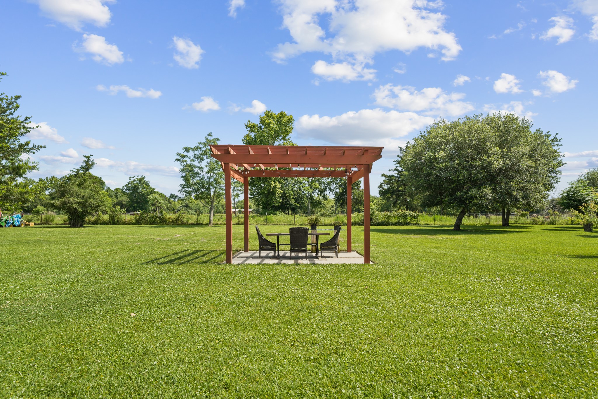 Pergola: Clean, isolated shot of the backyard seating area