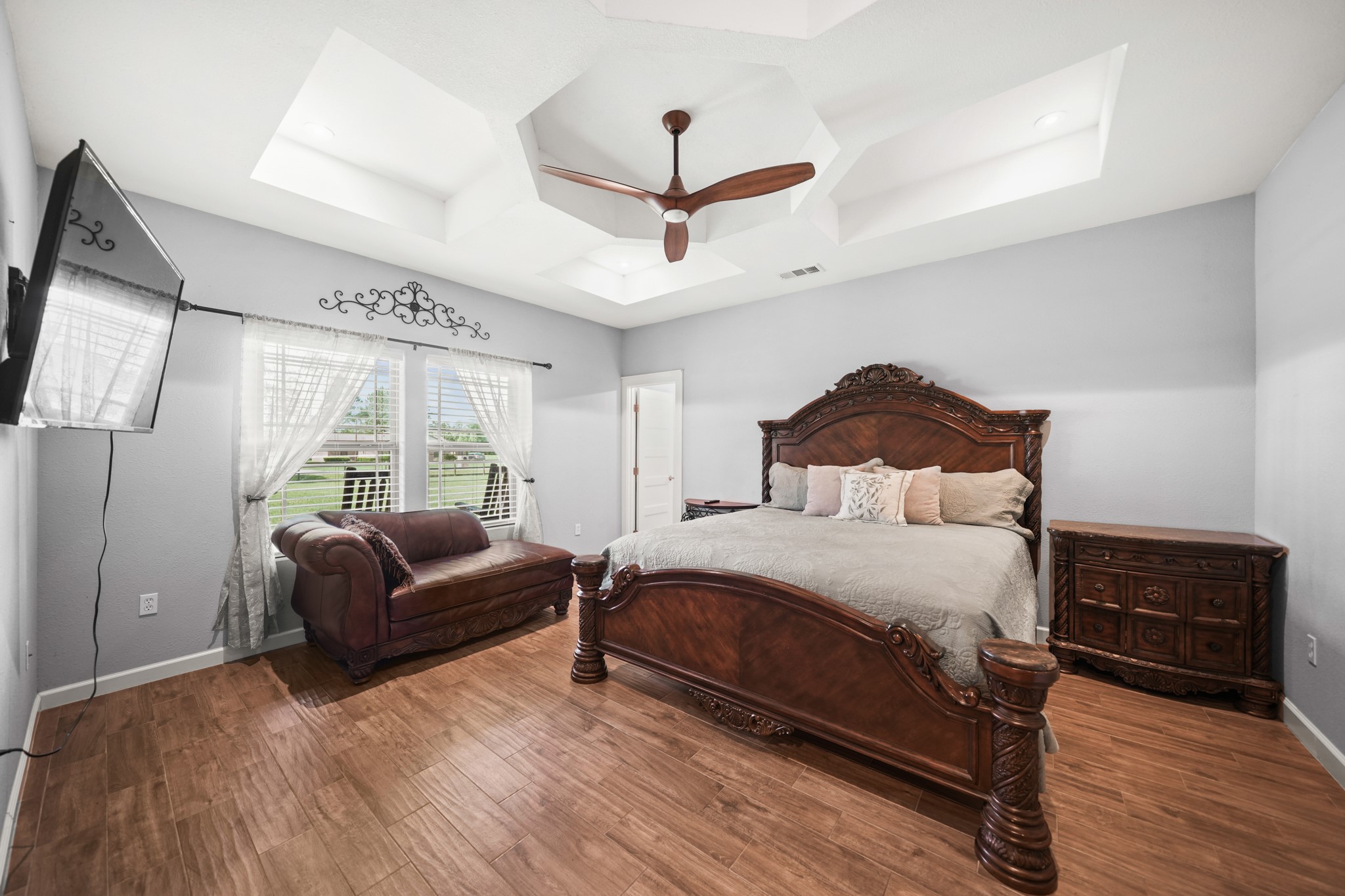 Primary Bedroom: The cleanest, most inviting shot of the primary bedroom showing the space and ceiling detail