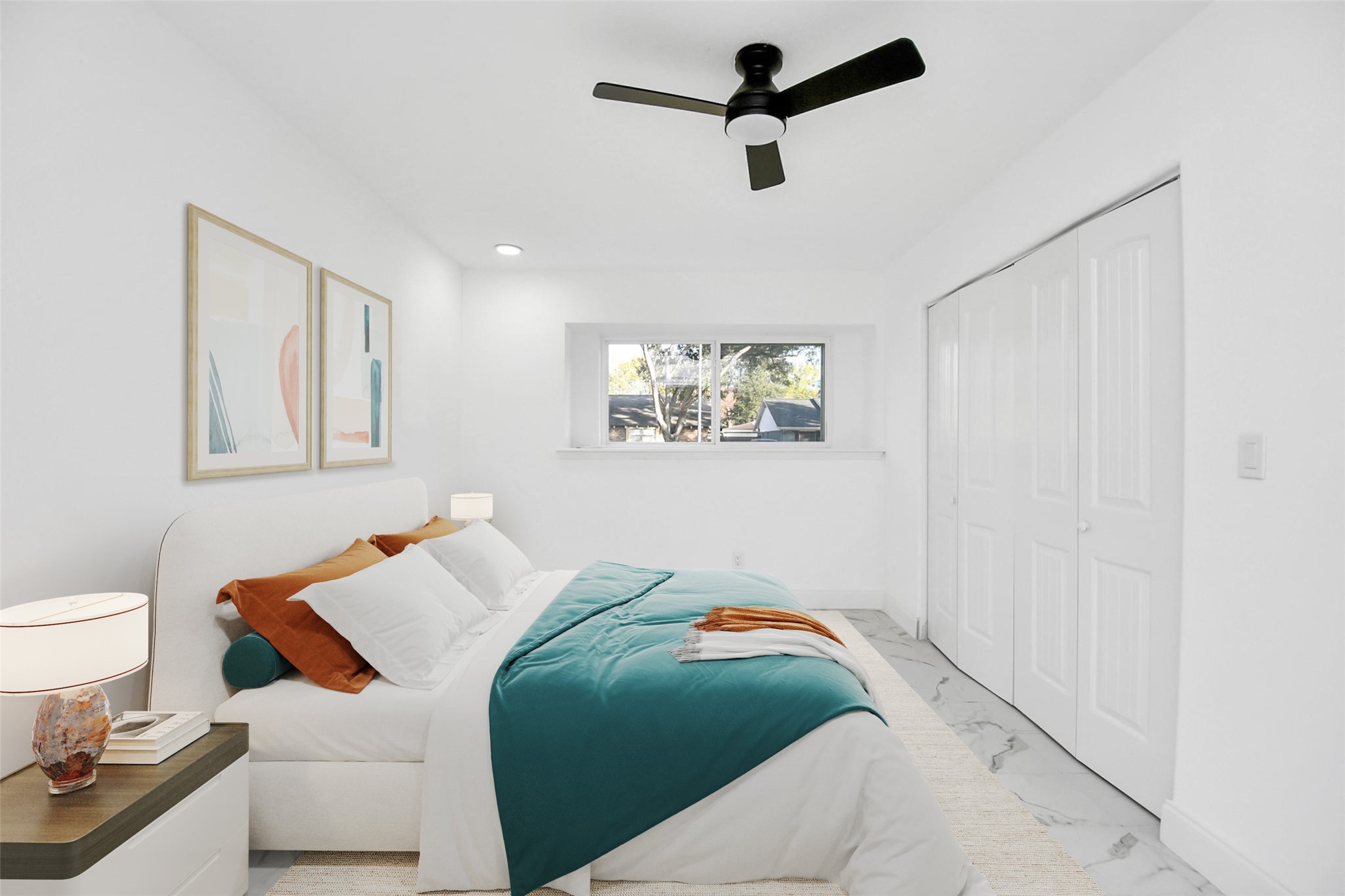 This owner's suite is generously sized, featuring the same marble subway tiles and crisp white walls, providing the perfect canvas for your design ideas. (Virtually Staged)