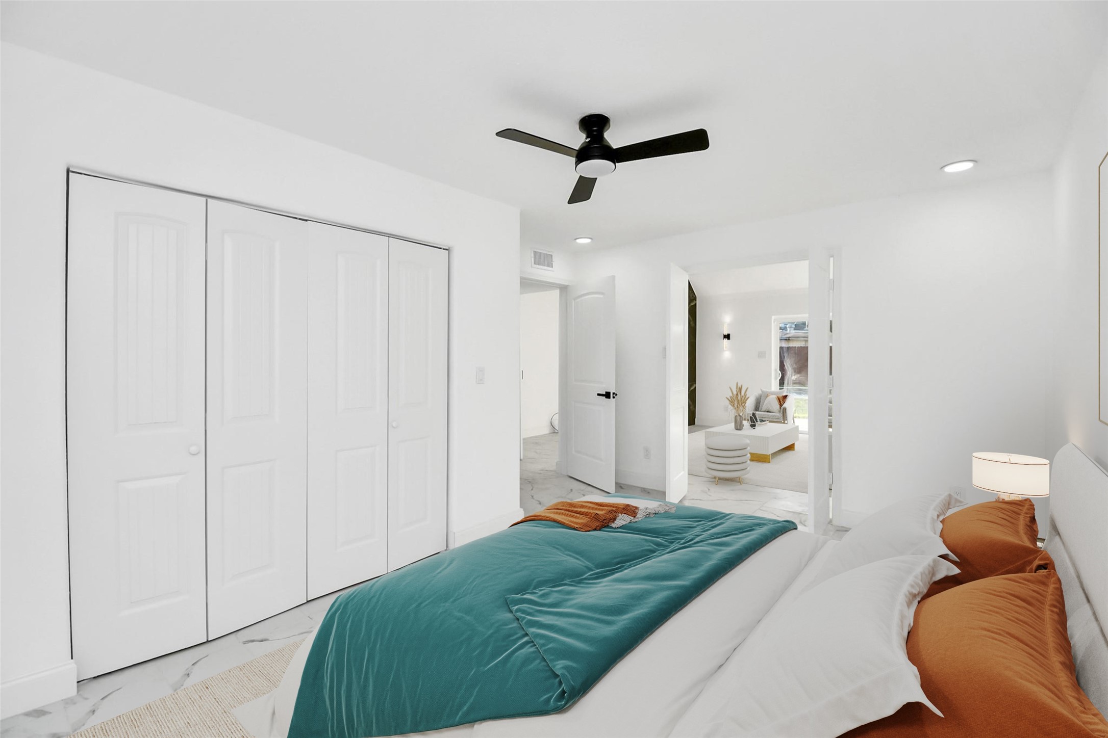This versatile downstairs room can function as a primary bedroom or be transformed into a flexible space, ideal for a media room or office. (Virtually staged