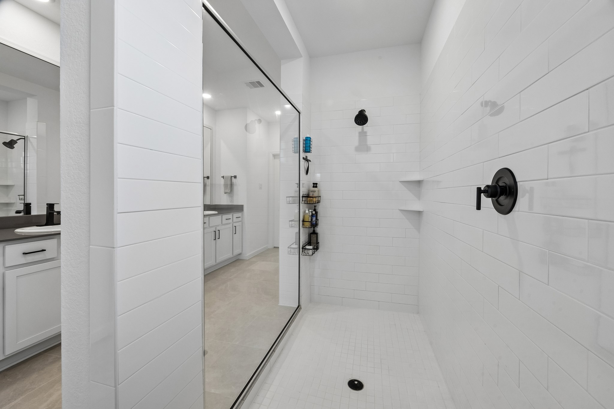 Oversized walk-in shower.