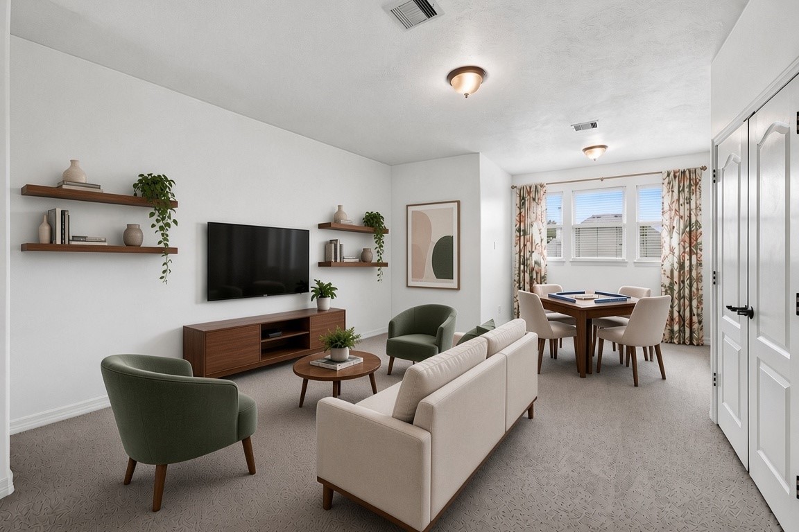 virtually staged - gameroom located on the 2nd floor. Double doors lead to media room