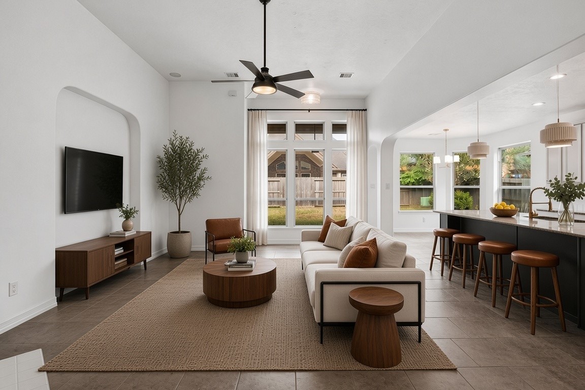 virtually staged - living room with gas log fireplace, large windows and great layout