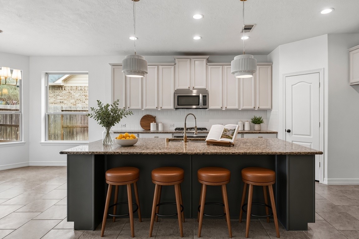 virtually staged - large island with designer lighting virtually staged - large island with designer lighting
