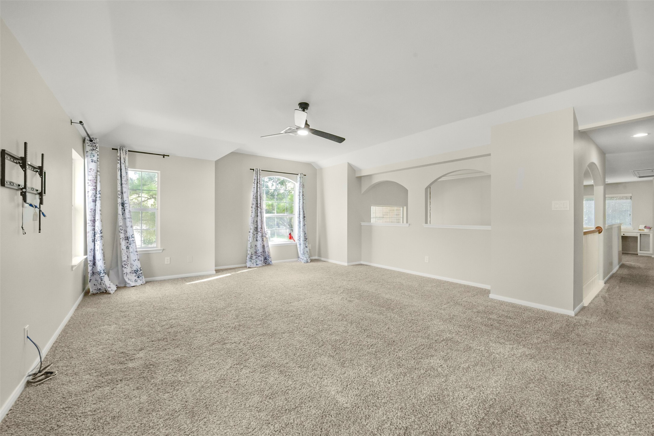 Versatile game room perfect for pool, card games, or relaxing with a comfy couch and large screen TVmake it your own entertainment haven!
