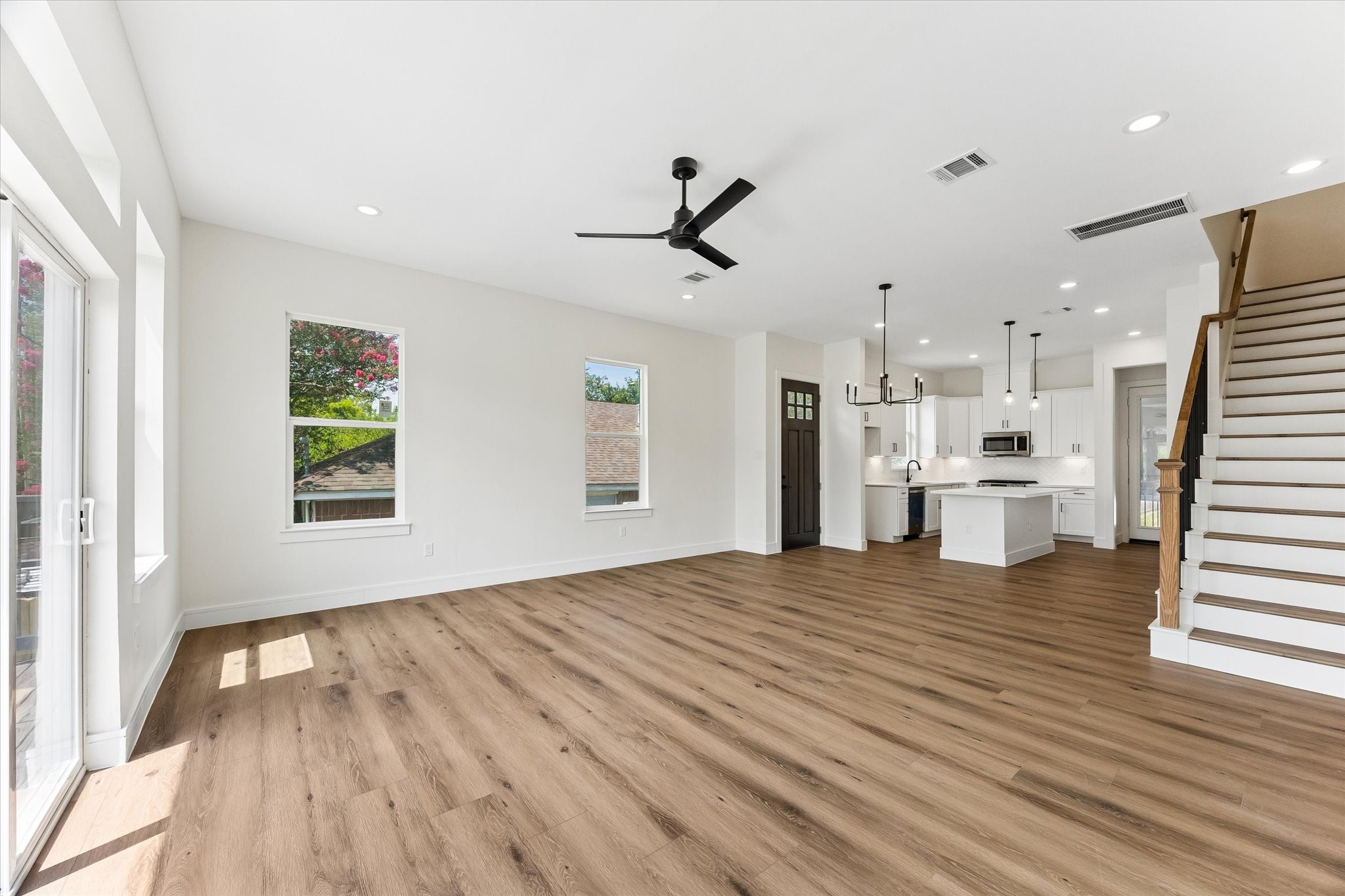 Tall ceilings, doors throughout both units featuring laminate wood flooring throughout. Tall ceilings, doors throughout both units featuring laminate wood flooring throughout.