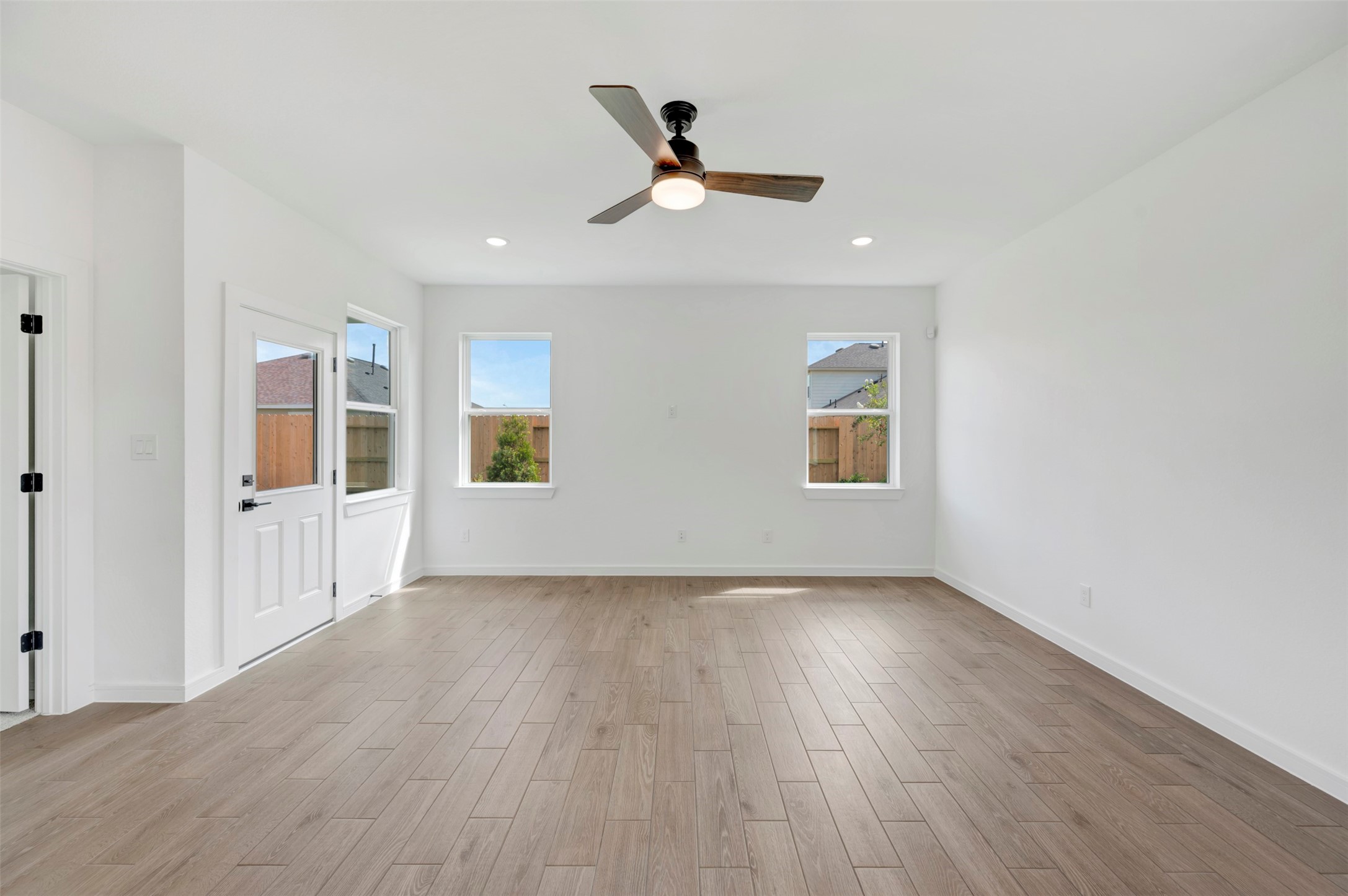 Great room with ceiling fan