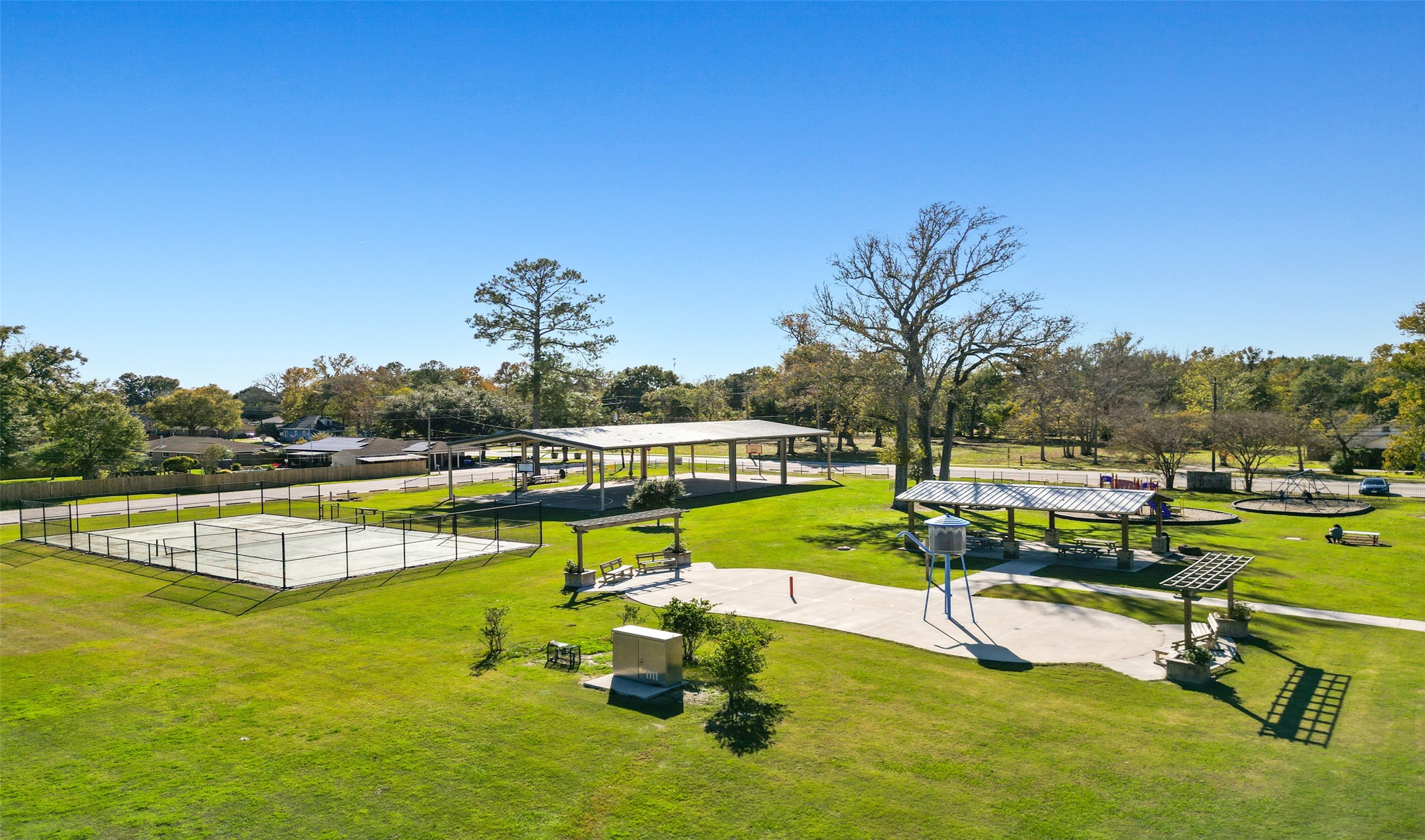Parker Park offers basketball courts, a pavilion, picnic tables, playground, splashpad and tennis courts.