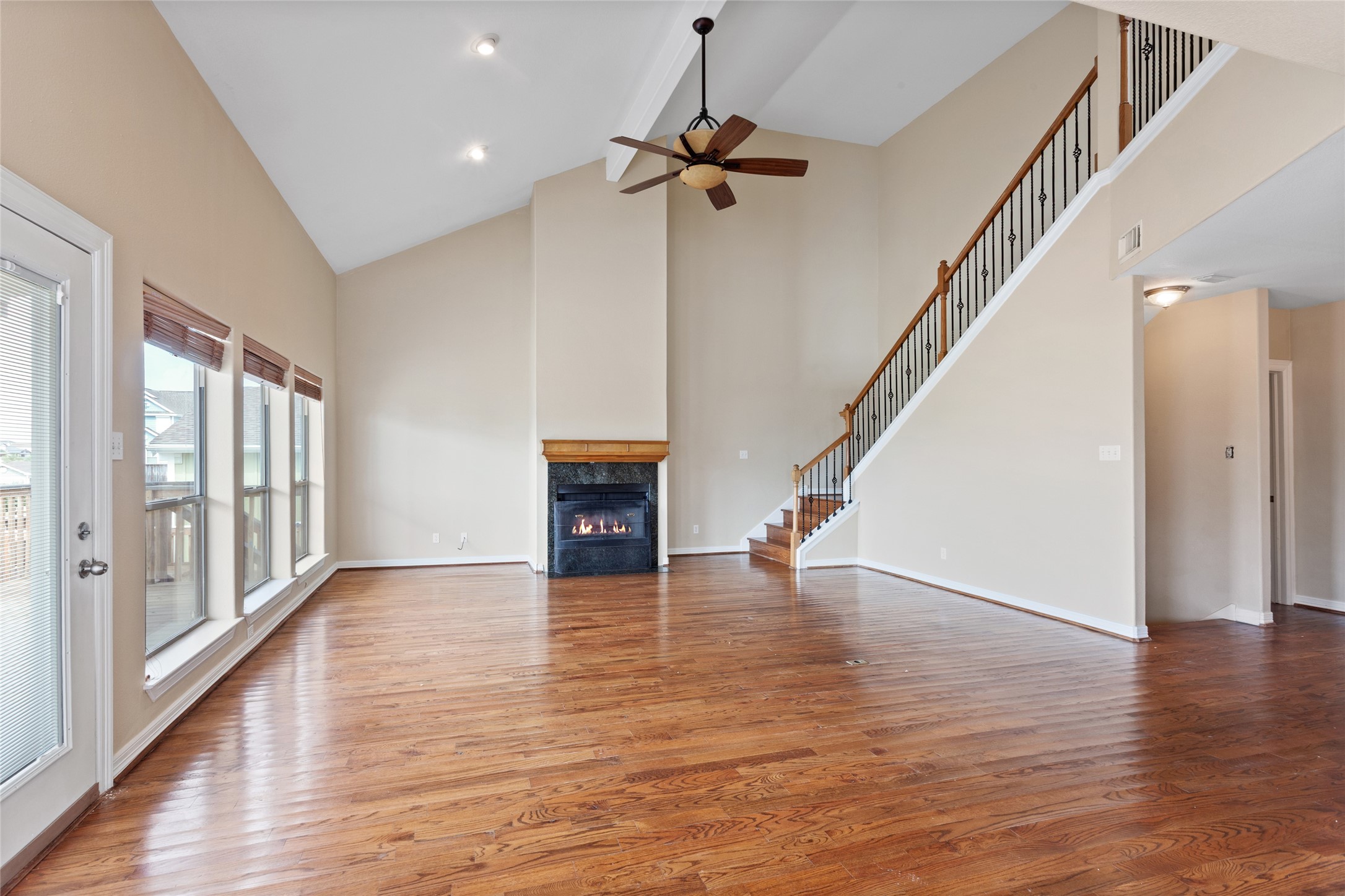 Second floor livingroom with wood burning fireplace