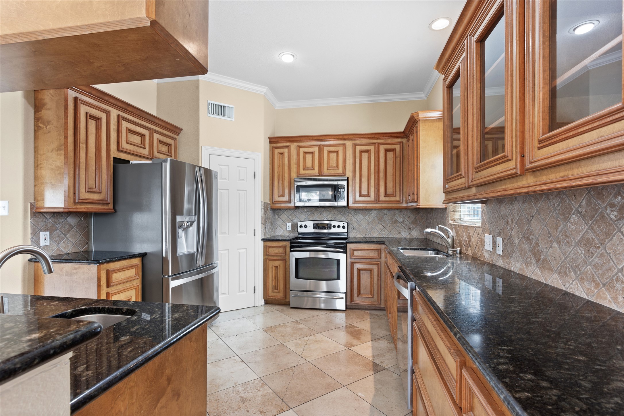 Second floor kitchen with stainless steel appliances