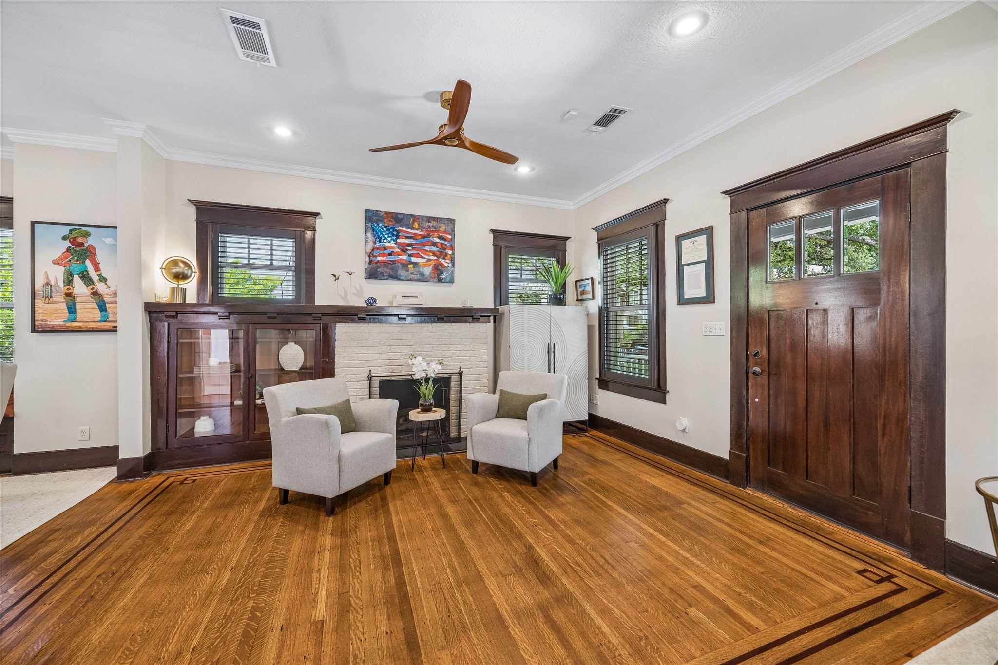 Stunning inlaid wooden floors add elegance and charm.