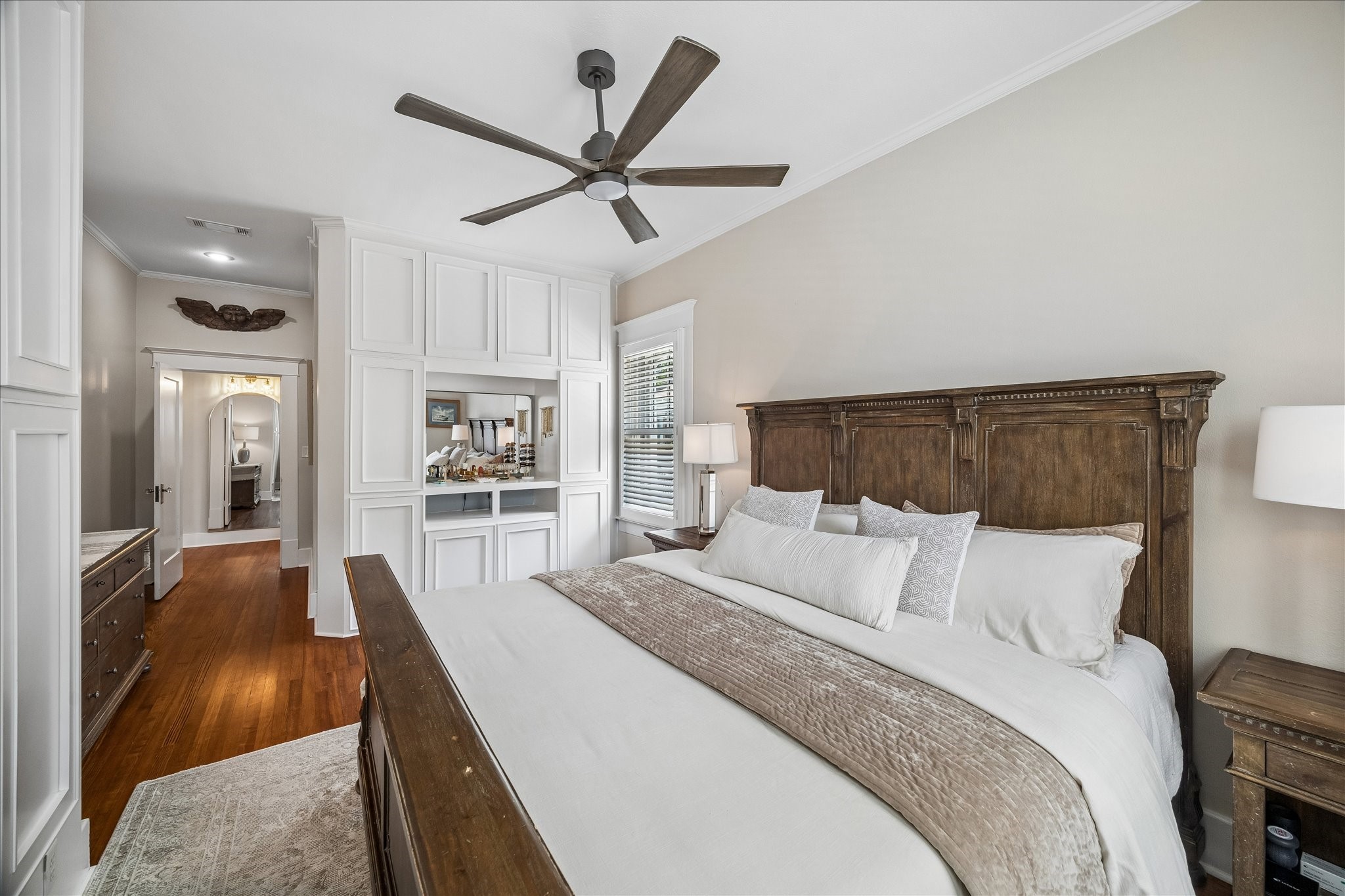 Spacious bedroom comfortably fits a king-size bed, offering ample room to relax.