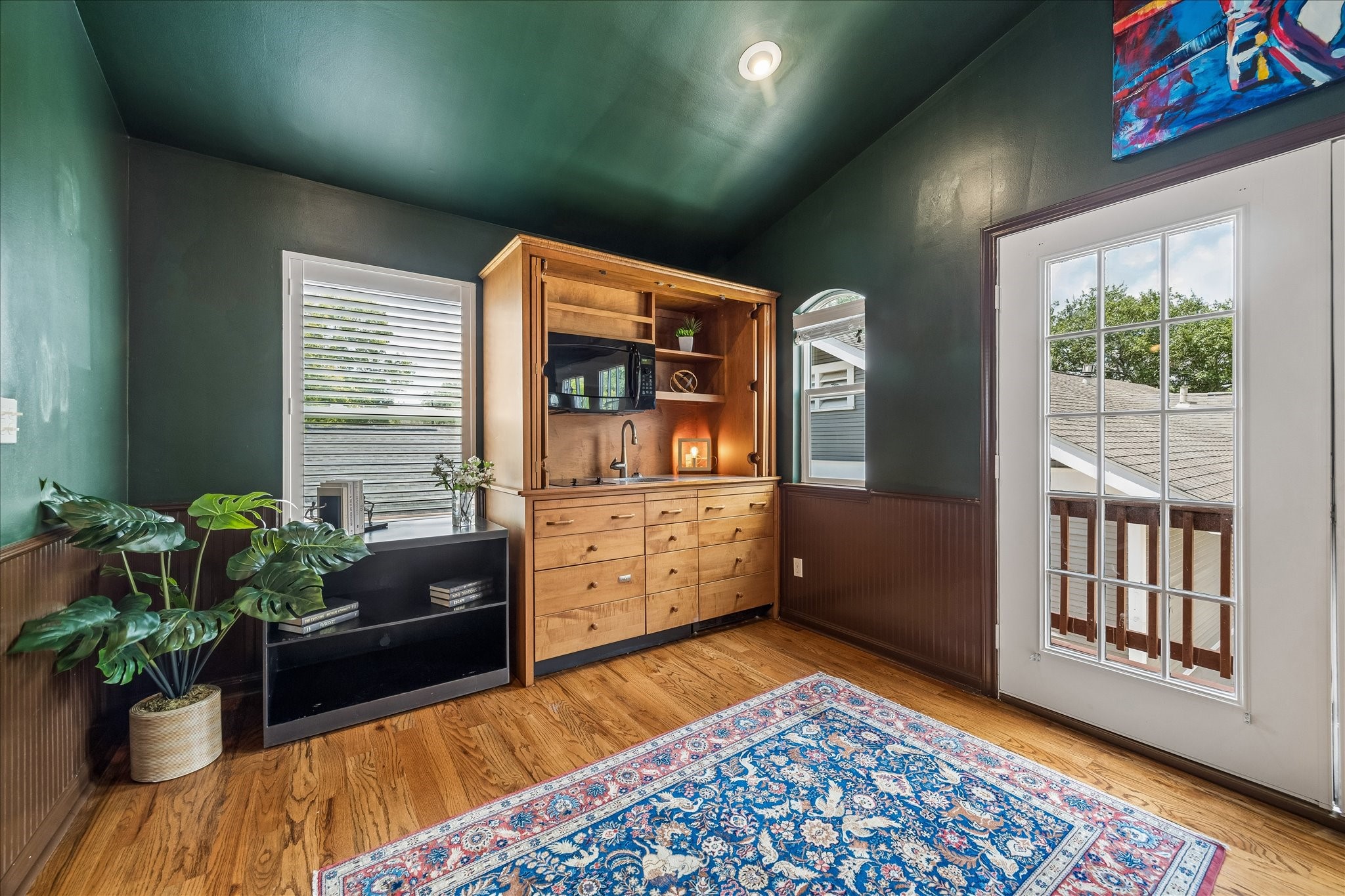 Flex space above repurposed garage - includes hideaway mini fridge and dishwasher