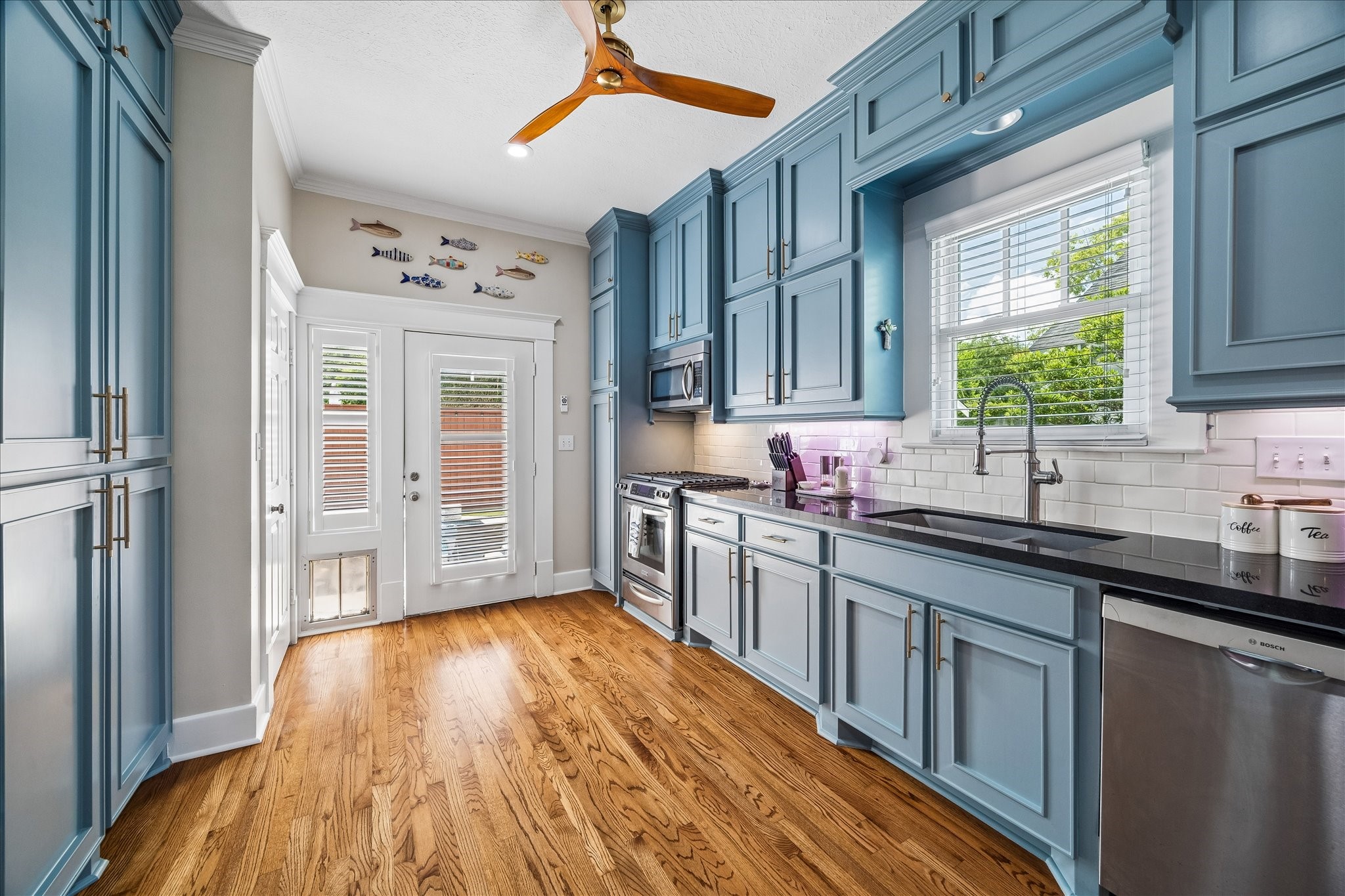 Expansive cabinetry and generous countertops.
