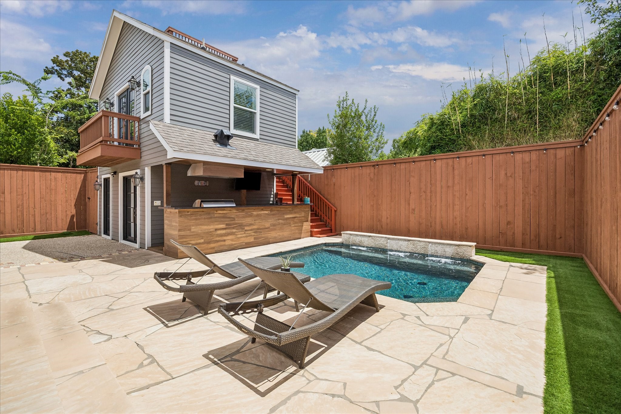 Experience year-round relaxation in this inviting pool oasis.