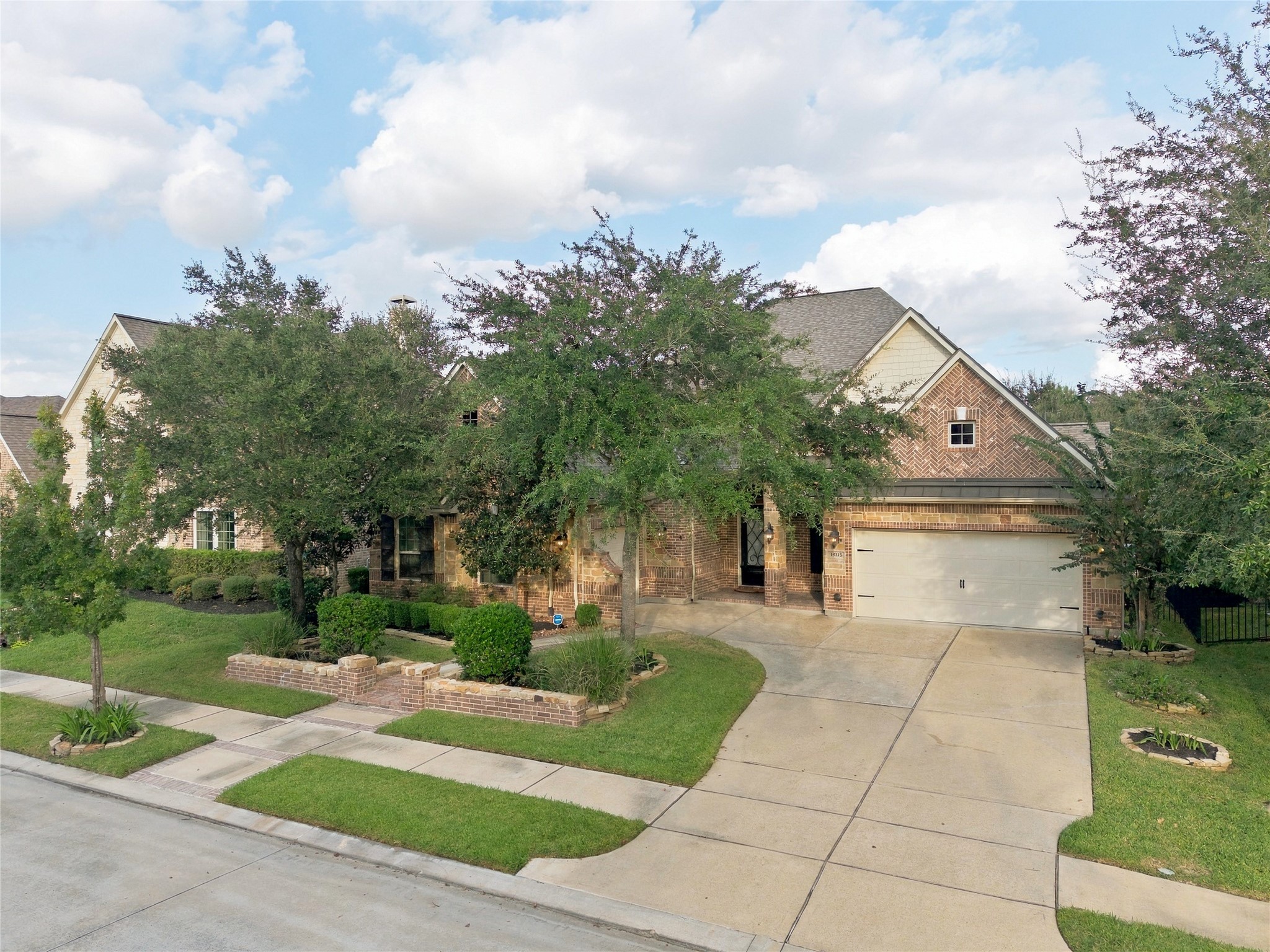 This spacious 1.5-story home offers 4 bedrooms, 3 full and 2 half baths, a dedicated home office, and a 3-car garage.