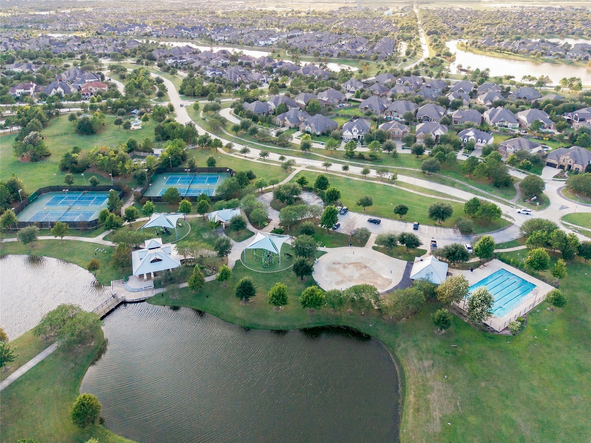 Enjoy Bridgeland's incredible community amenities, including swimming pools, tennis courts, walking trails, and scenic lakes.