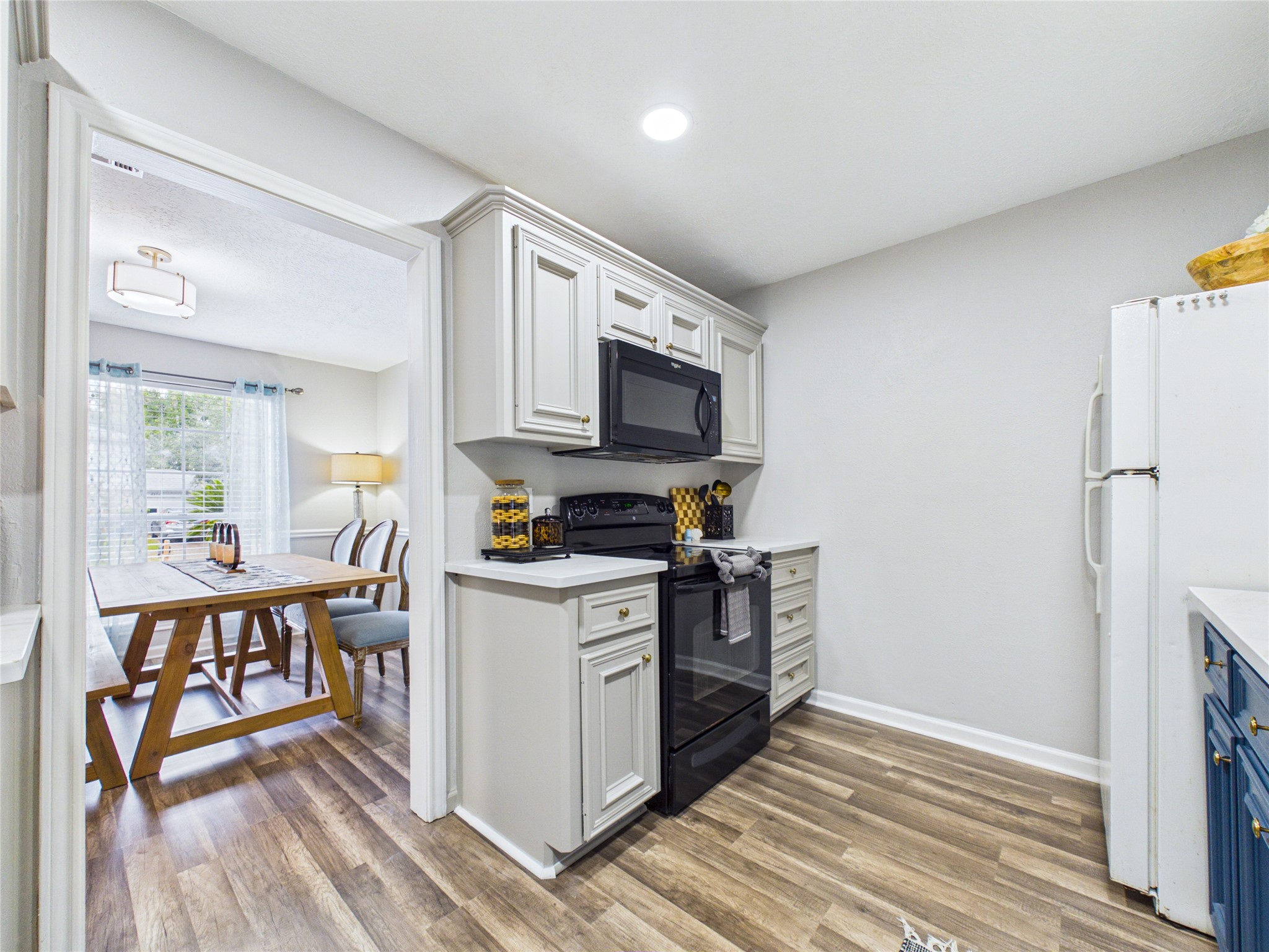 The kitchen flows directly into the dining room for easy passage.