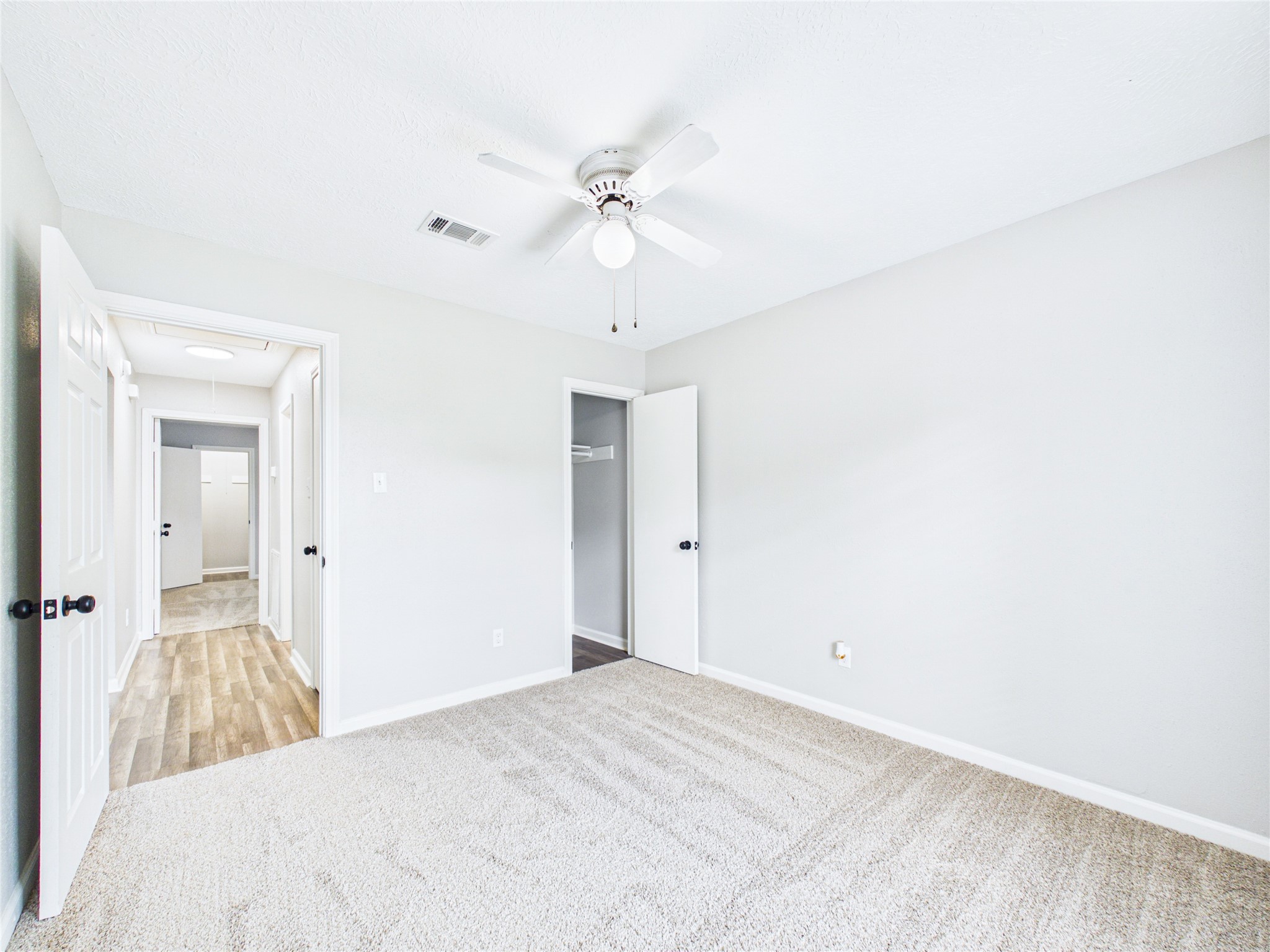 Guest Bedroom #1 with brand new carpet.