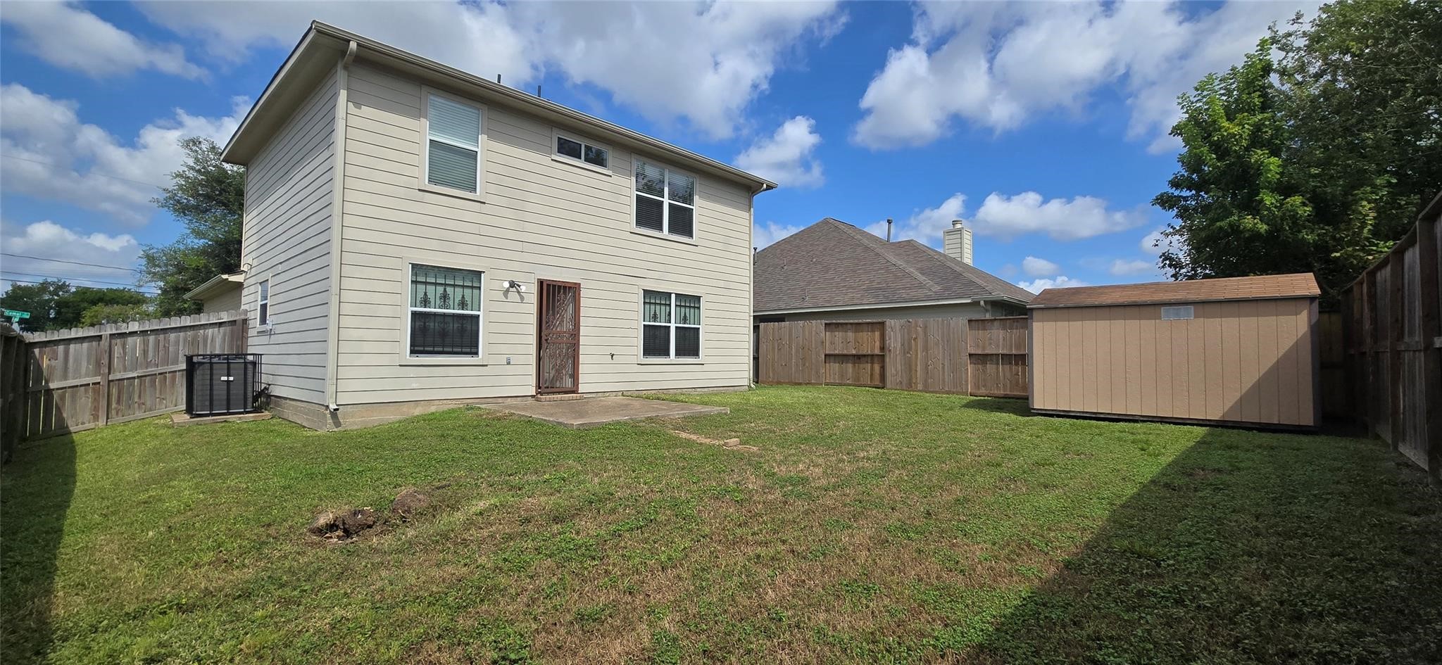 Property has shed for storage and backyard is fenced.