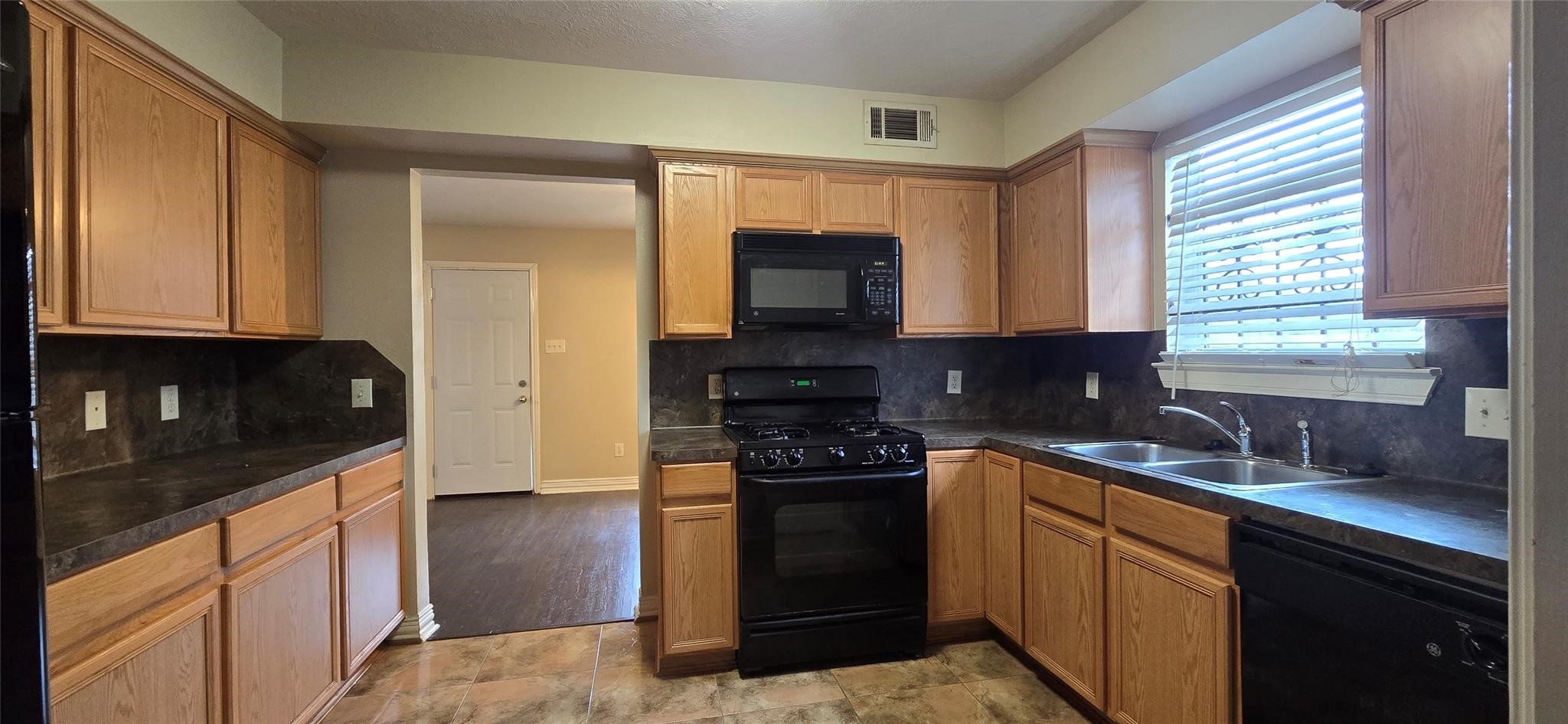 Garage access is through the kitchen.